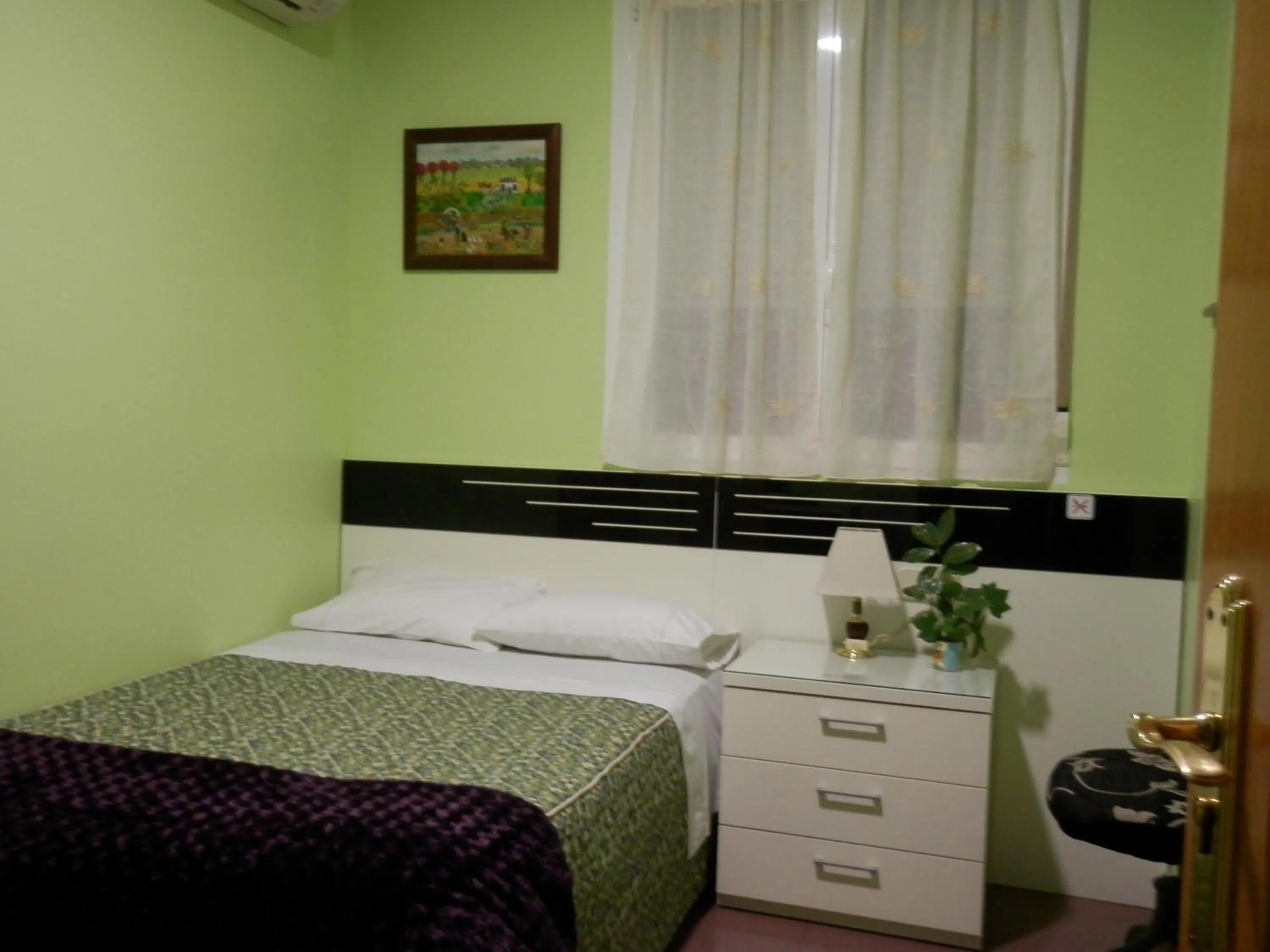 Decorative detail, Bed in Hostal del Pez Azul