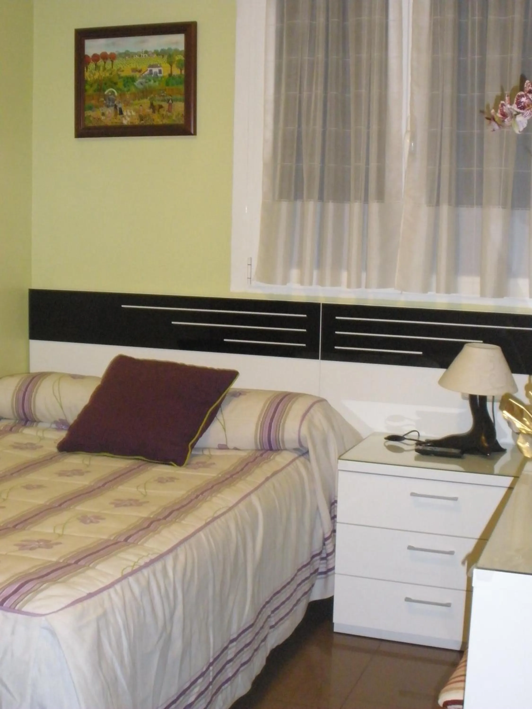 Bed in Hostal del Pez Azul