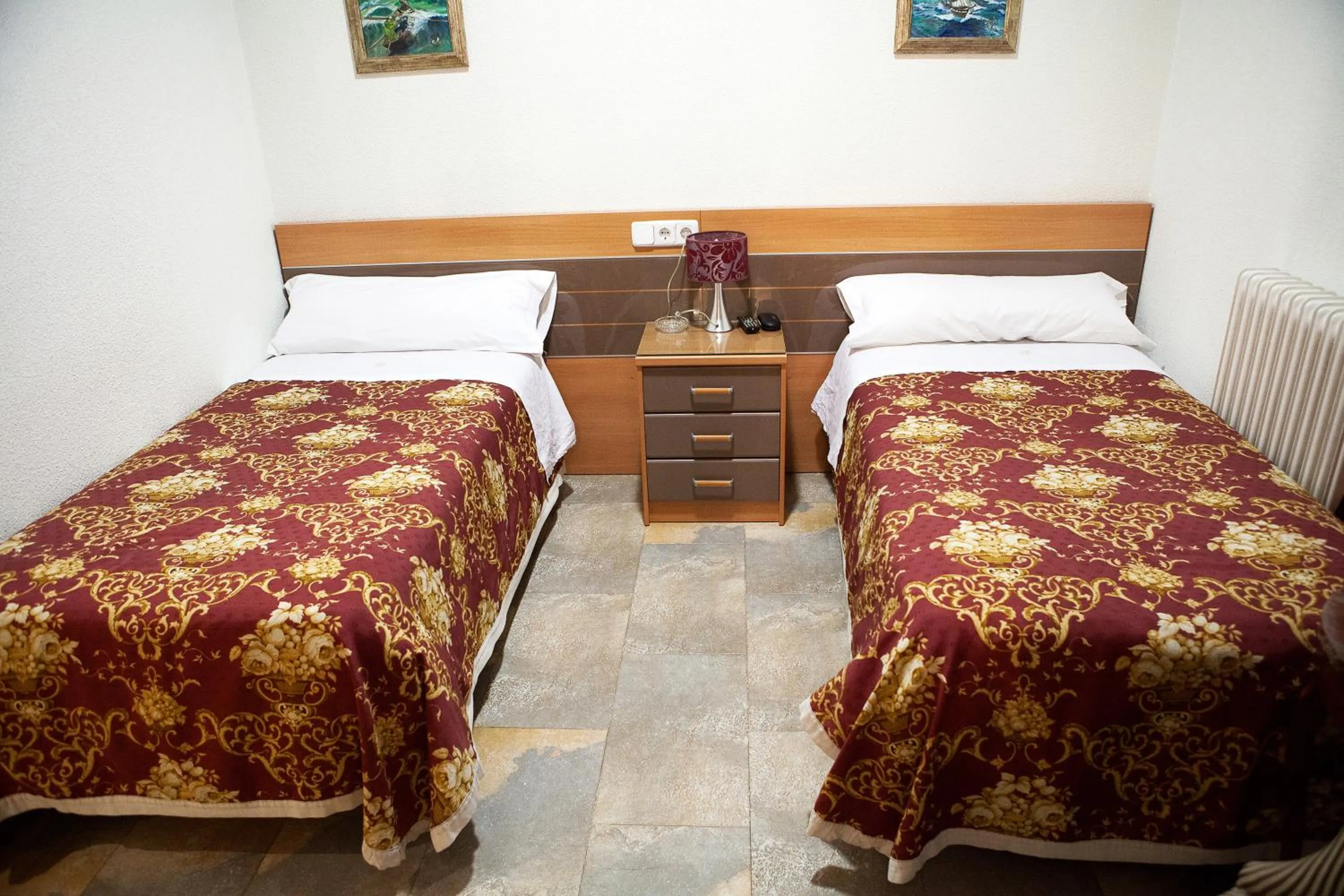 Bed in Hostal del Pez Azul