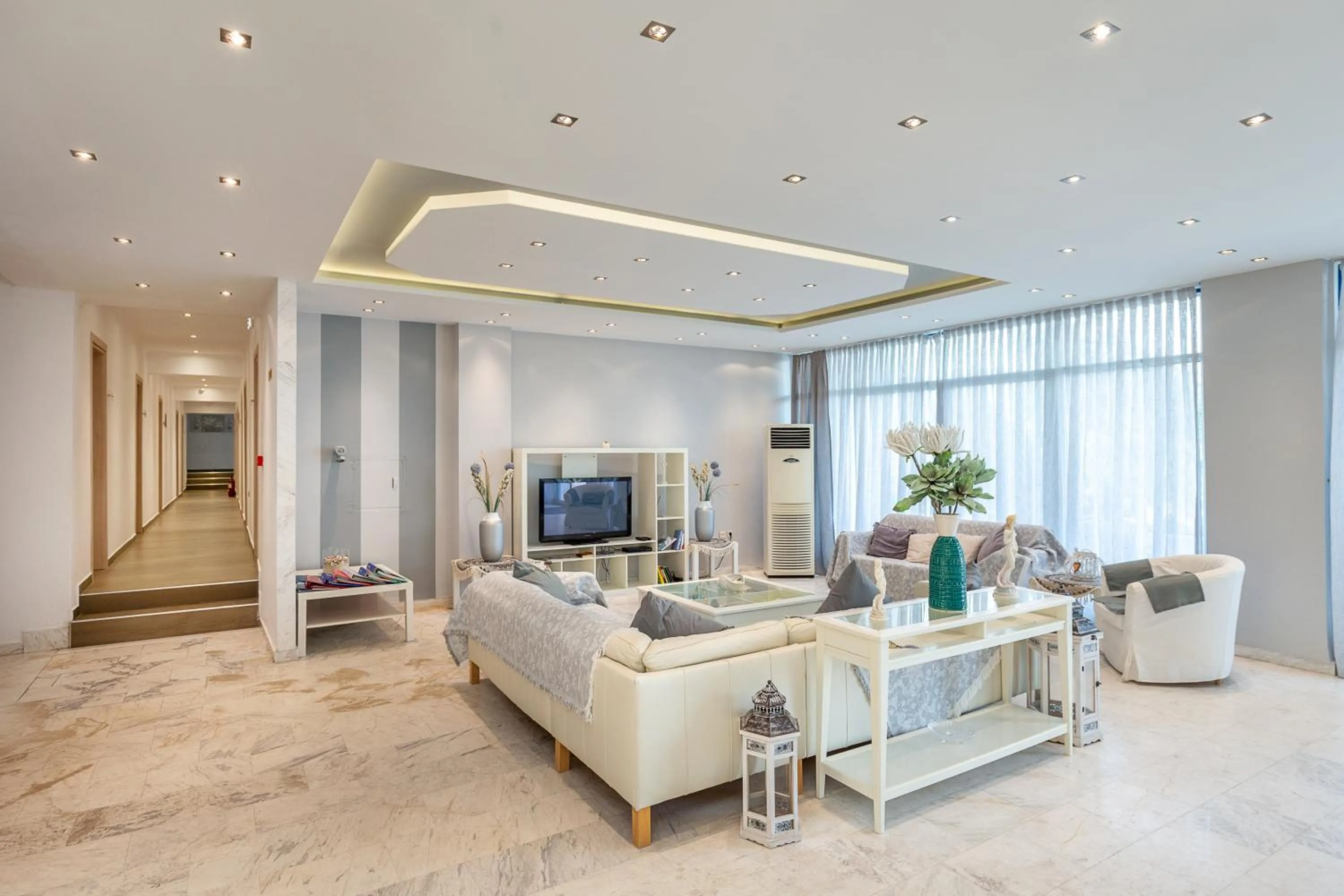 Communal lounge/ TV room in Astris Sun Hotel