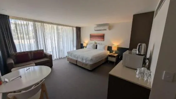 Seating area, Bed in Wyndham Resort Torquay