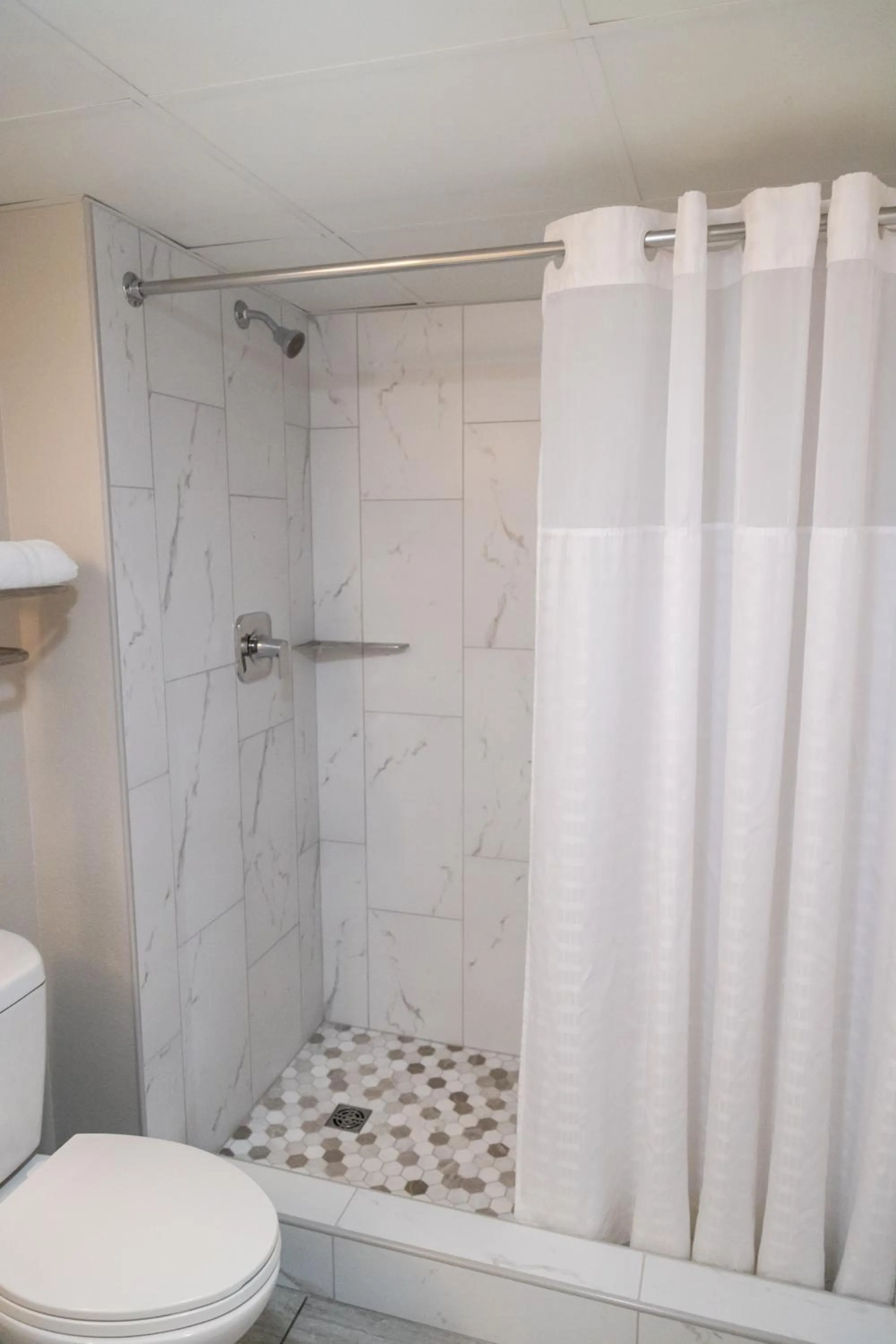 Shower in Twin Mountain Inn & Suites