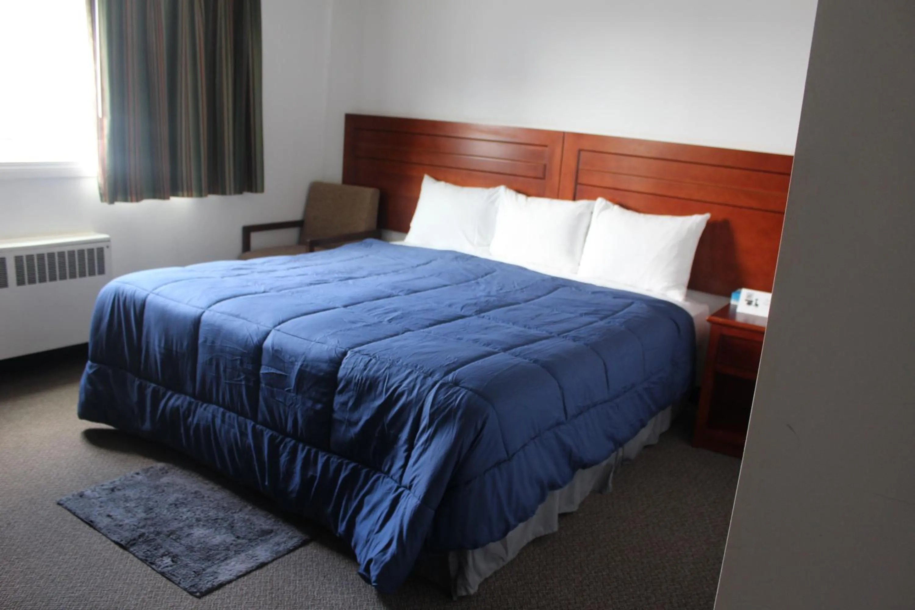 Bed in Esterhazy Motor Hotel