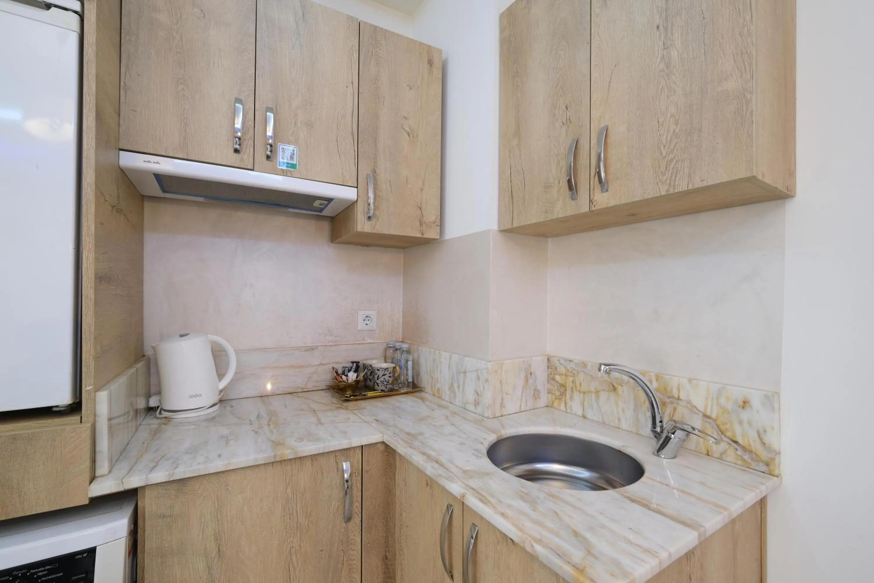 Kitchen or kitchenette in Loren Hotel&Suites