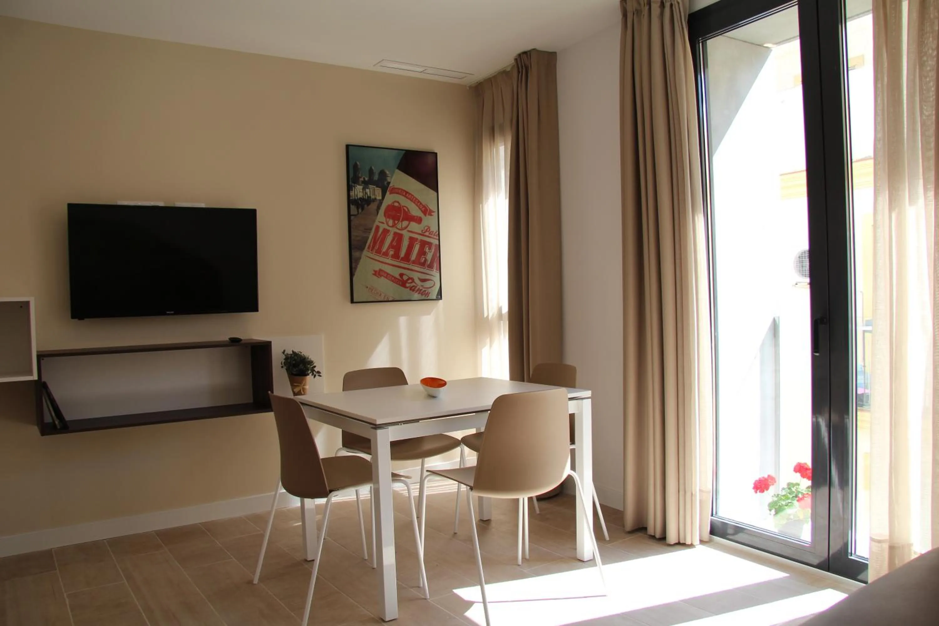Dining area in Apartamentos Maier