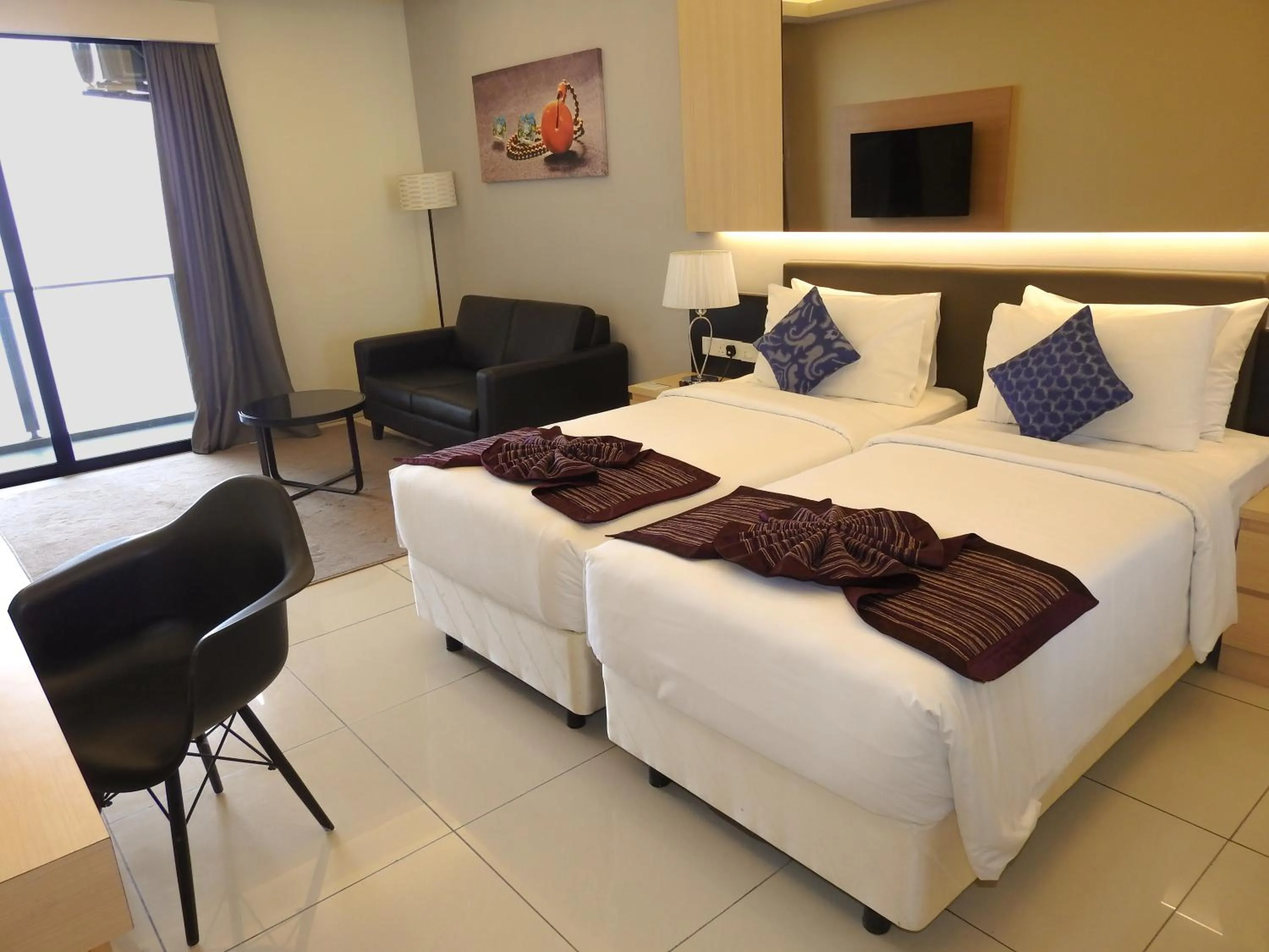 Bed in Grand Ion Delemen Hotel