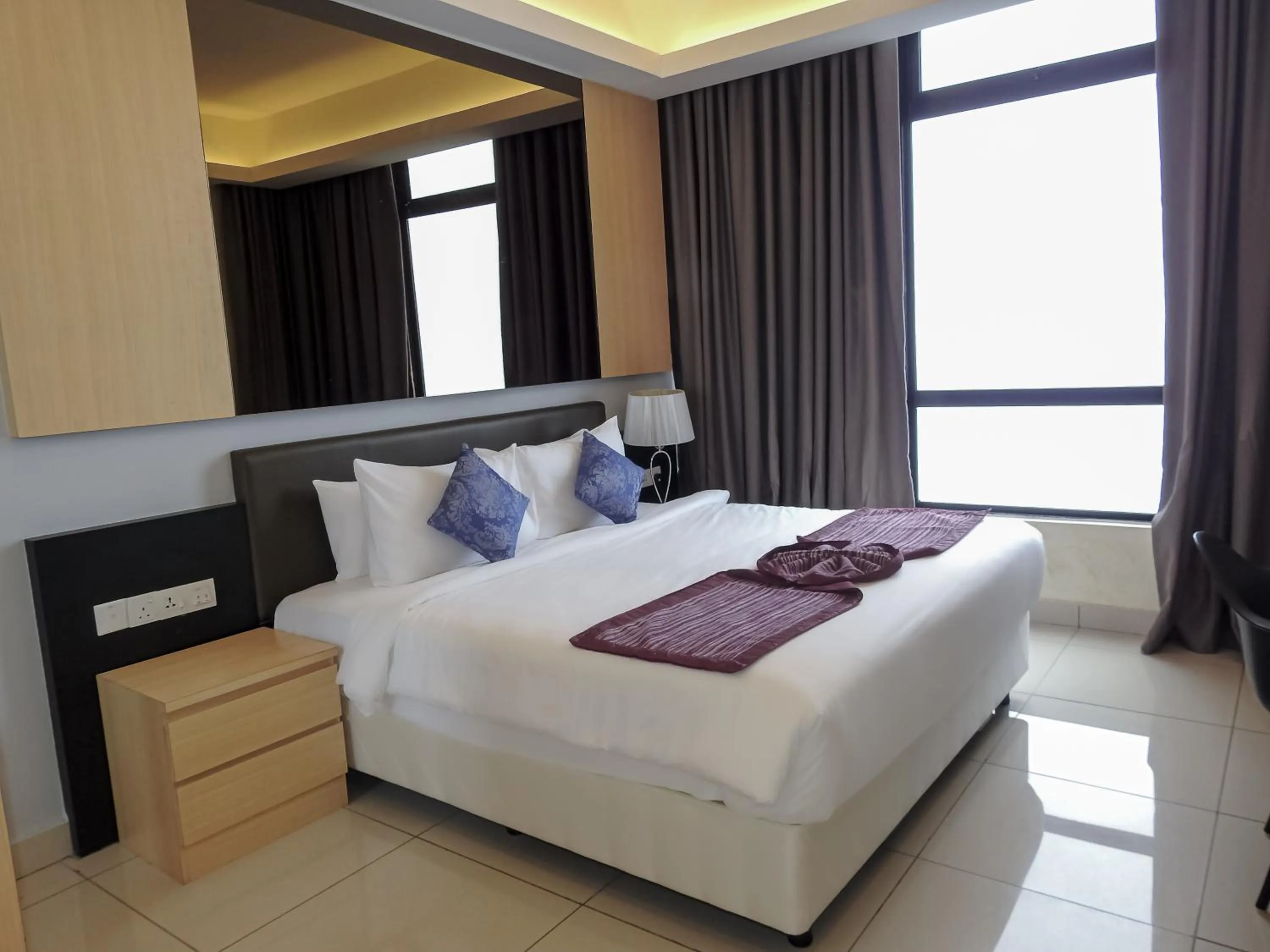 Bed in Grand Ion Delemen Hotel