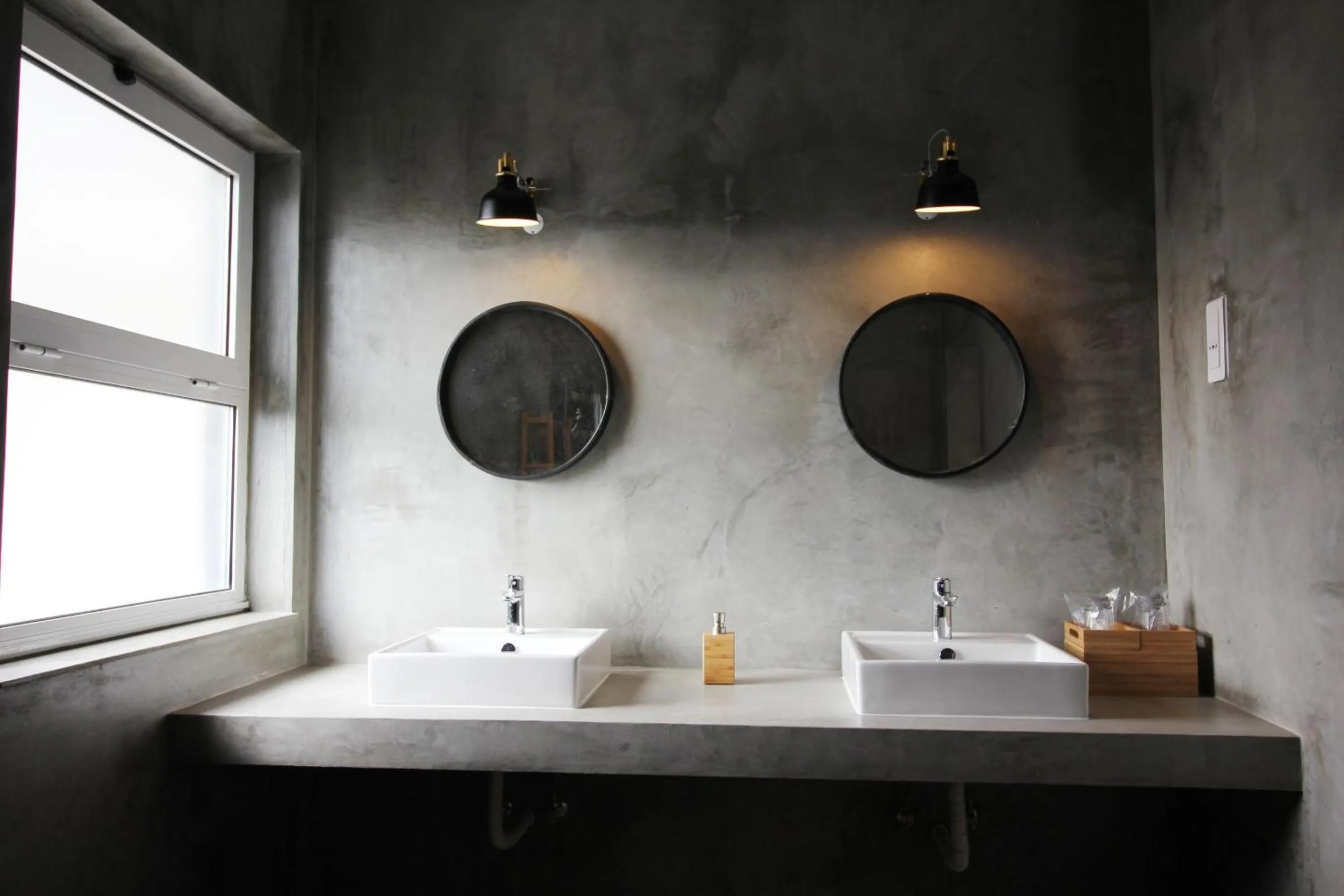 Bathroom in Vinha da Areia Beach Hotel