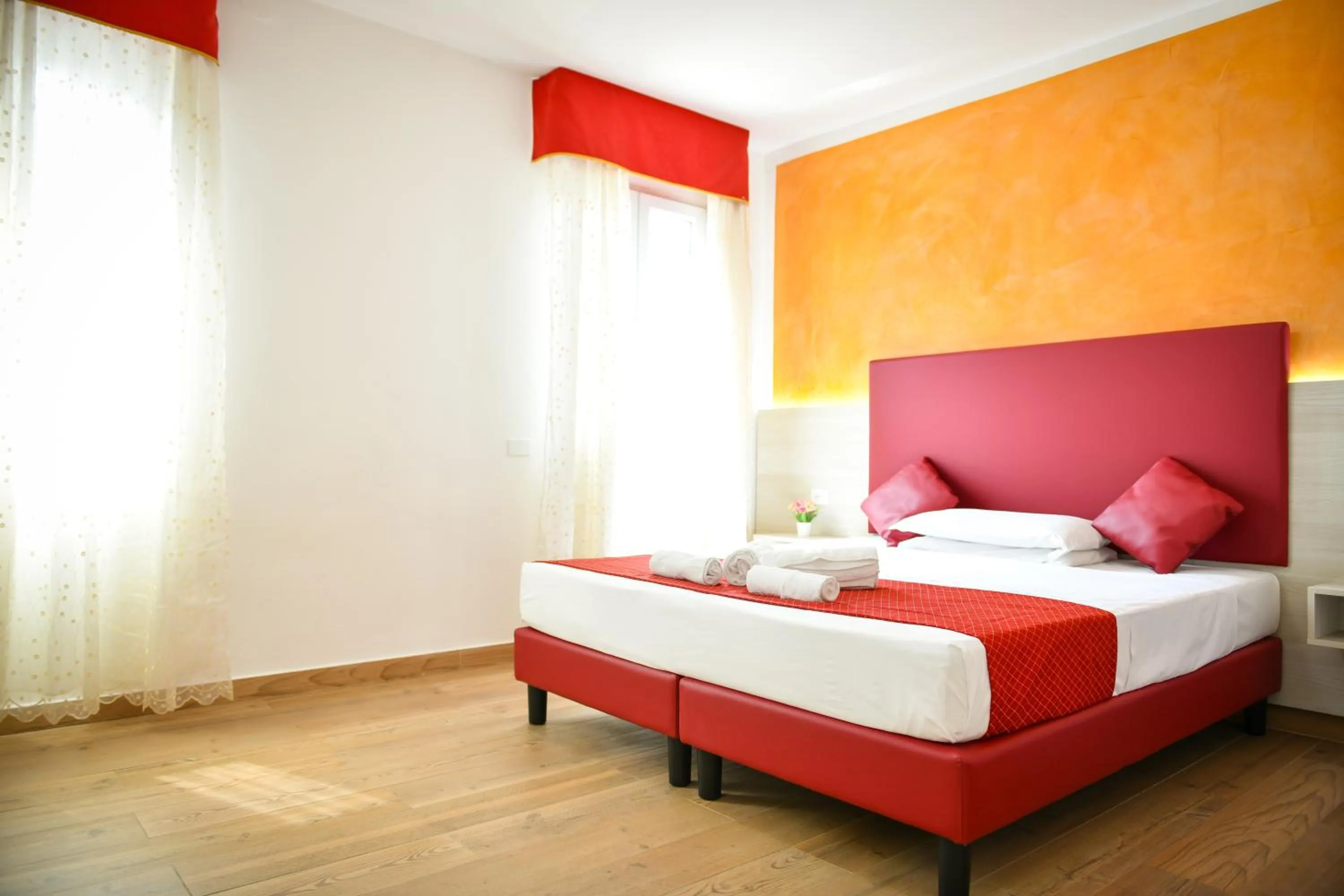 Bed in Vacation Venice Rooms