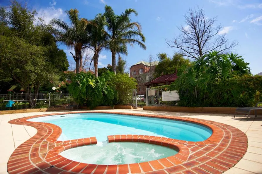 Swimming pool in Comfort Apartments Royal Gardens