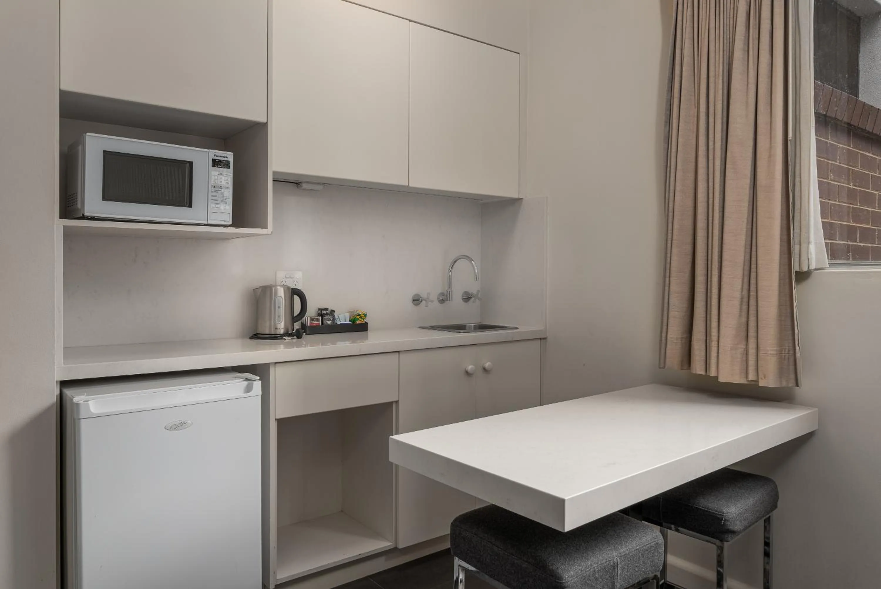 Kitchen or kitchenette in City Limits Hotel Apartments