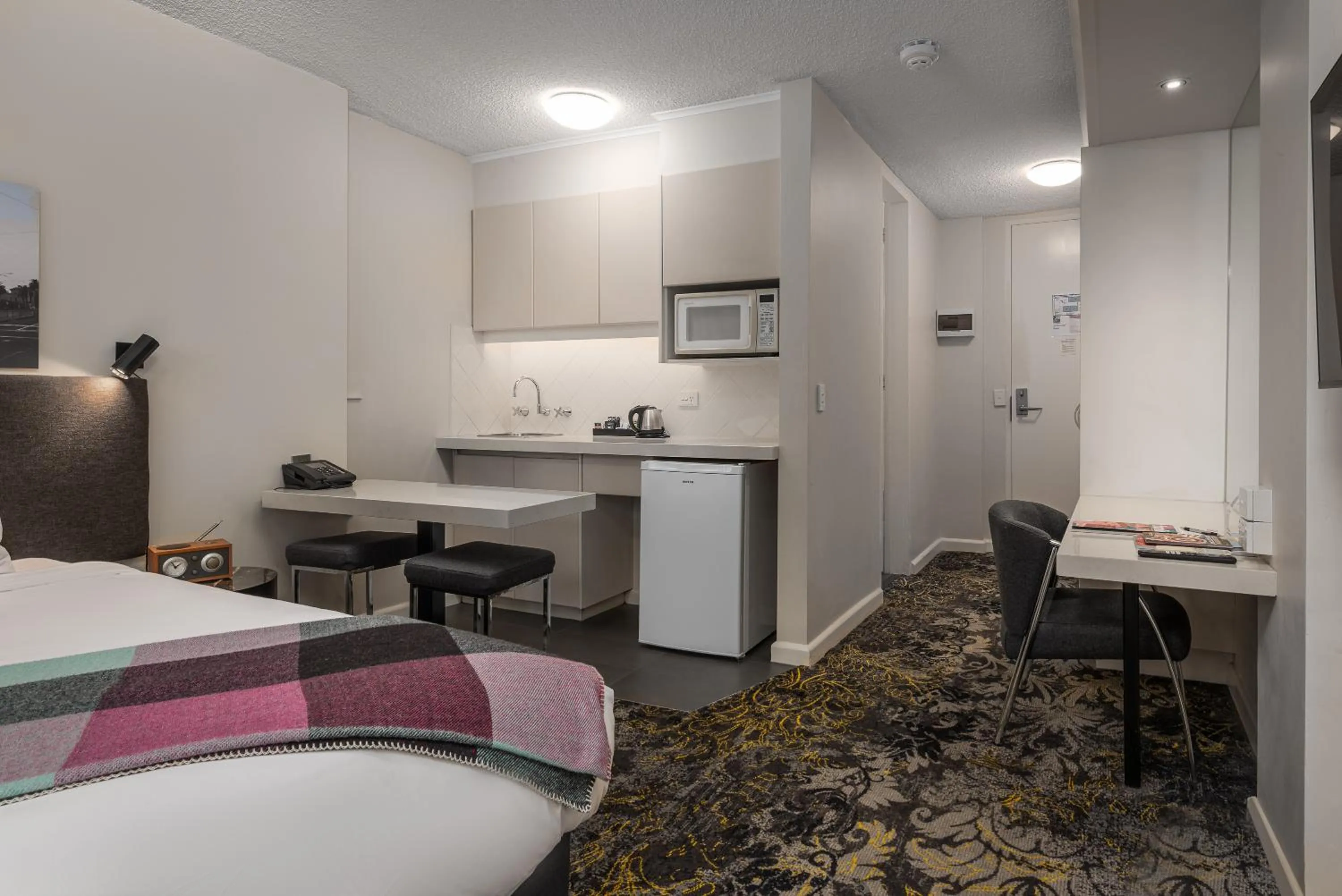 Bedroom in City Limits Hotel Apartments