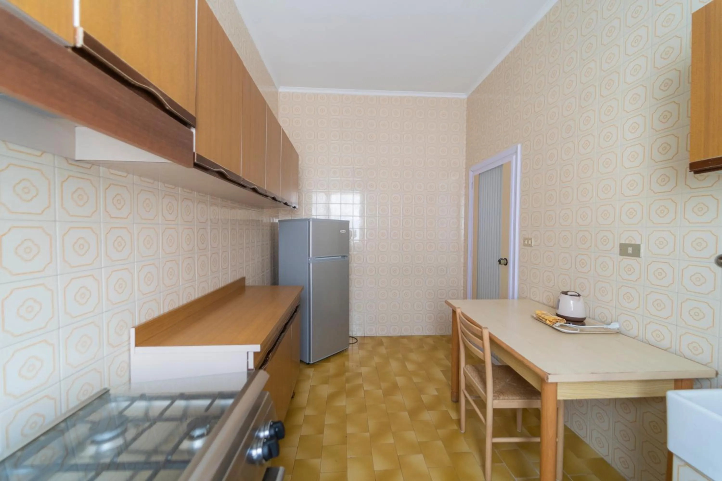 Kitchen or kitchenette in Casa Vacanza San Pietro
