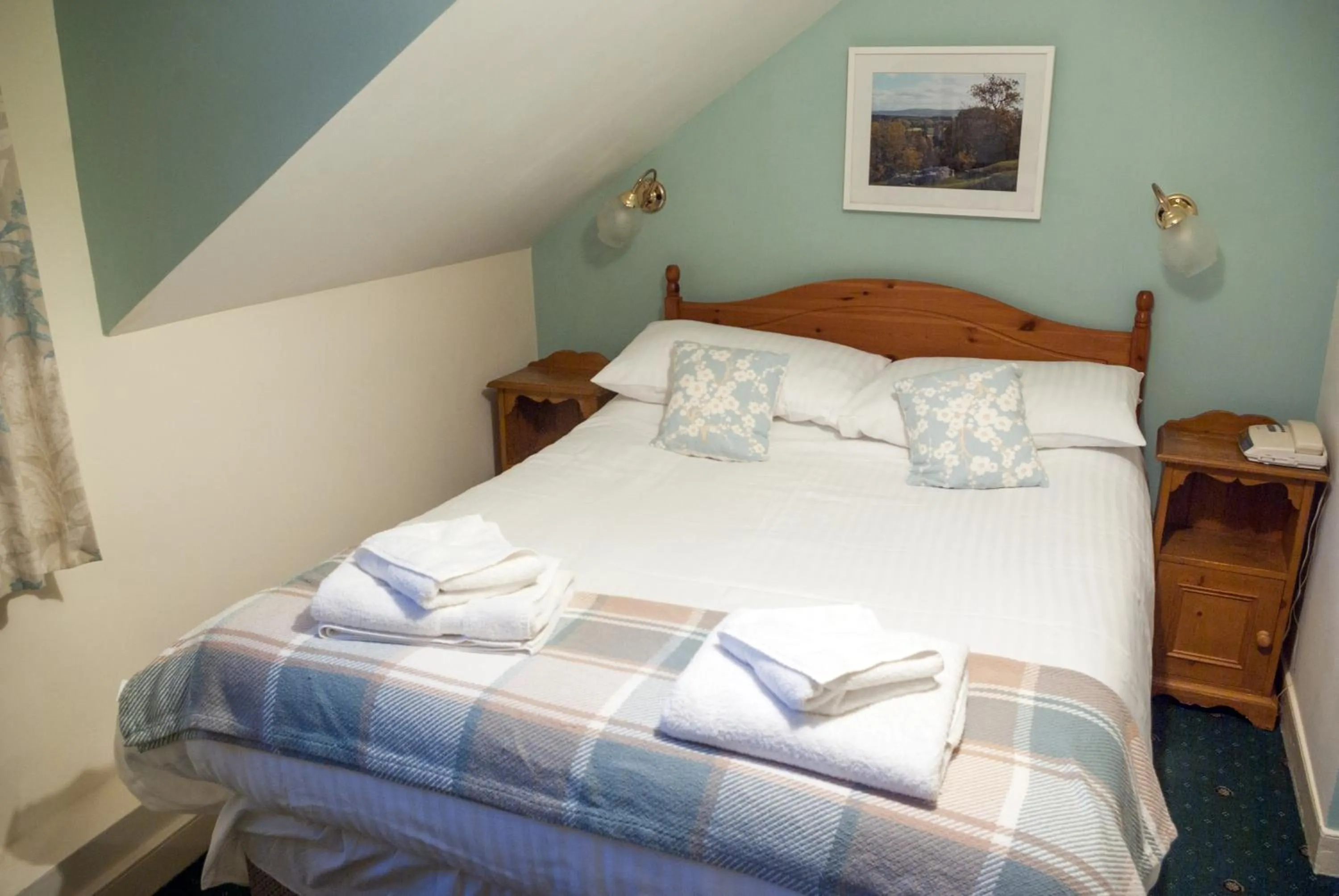 Bed in The Dragon Hotel