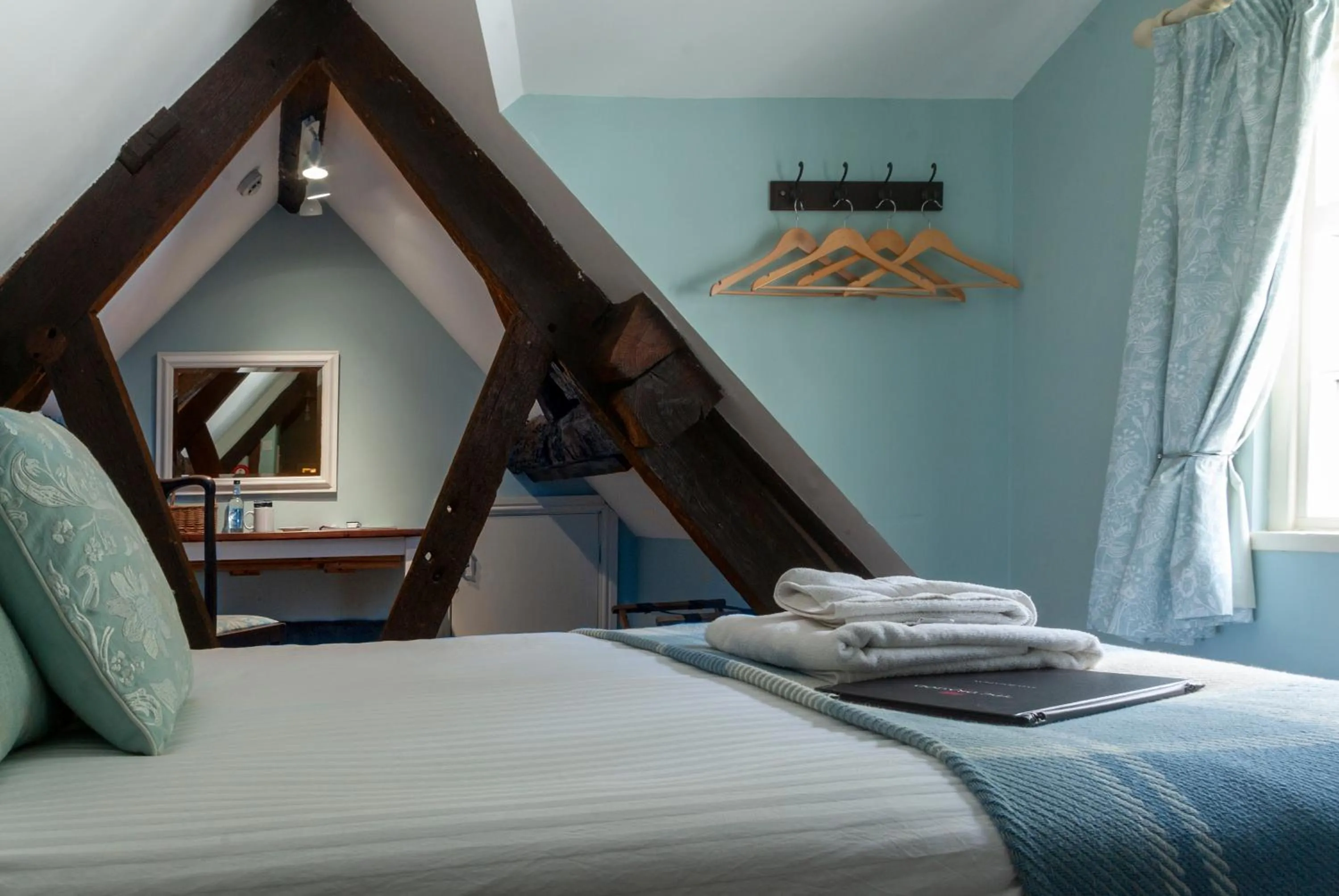 Bed in The Dragon Hotel