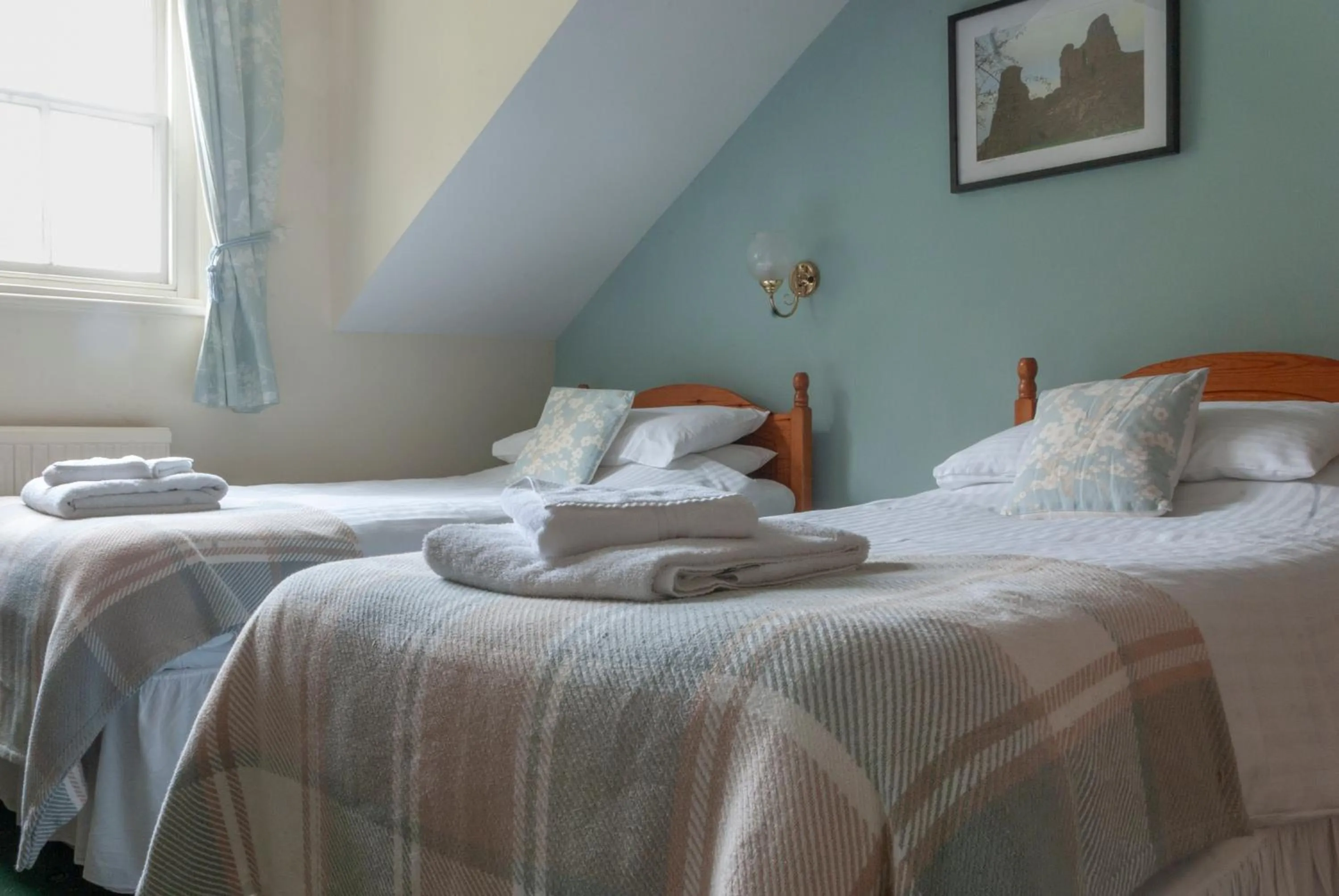 Bed in The Dragon Hotel