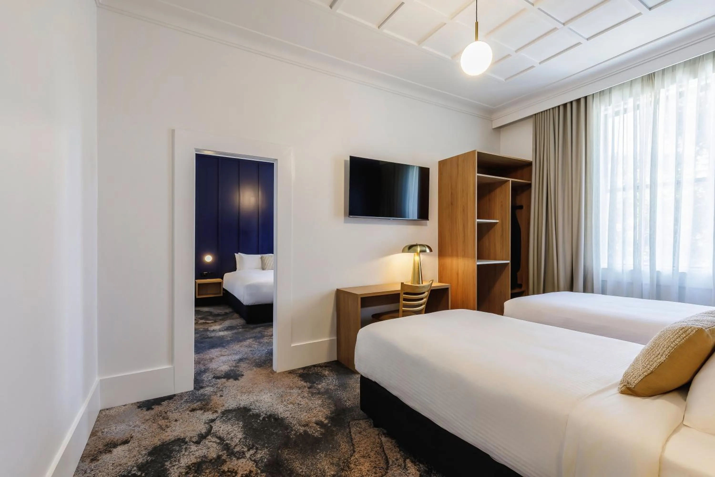 Bed in Royal Exhibition Hotel