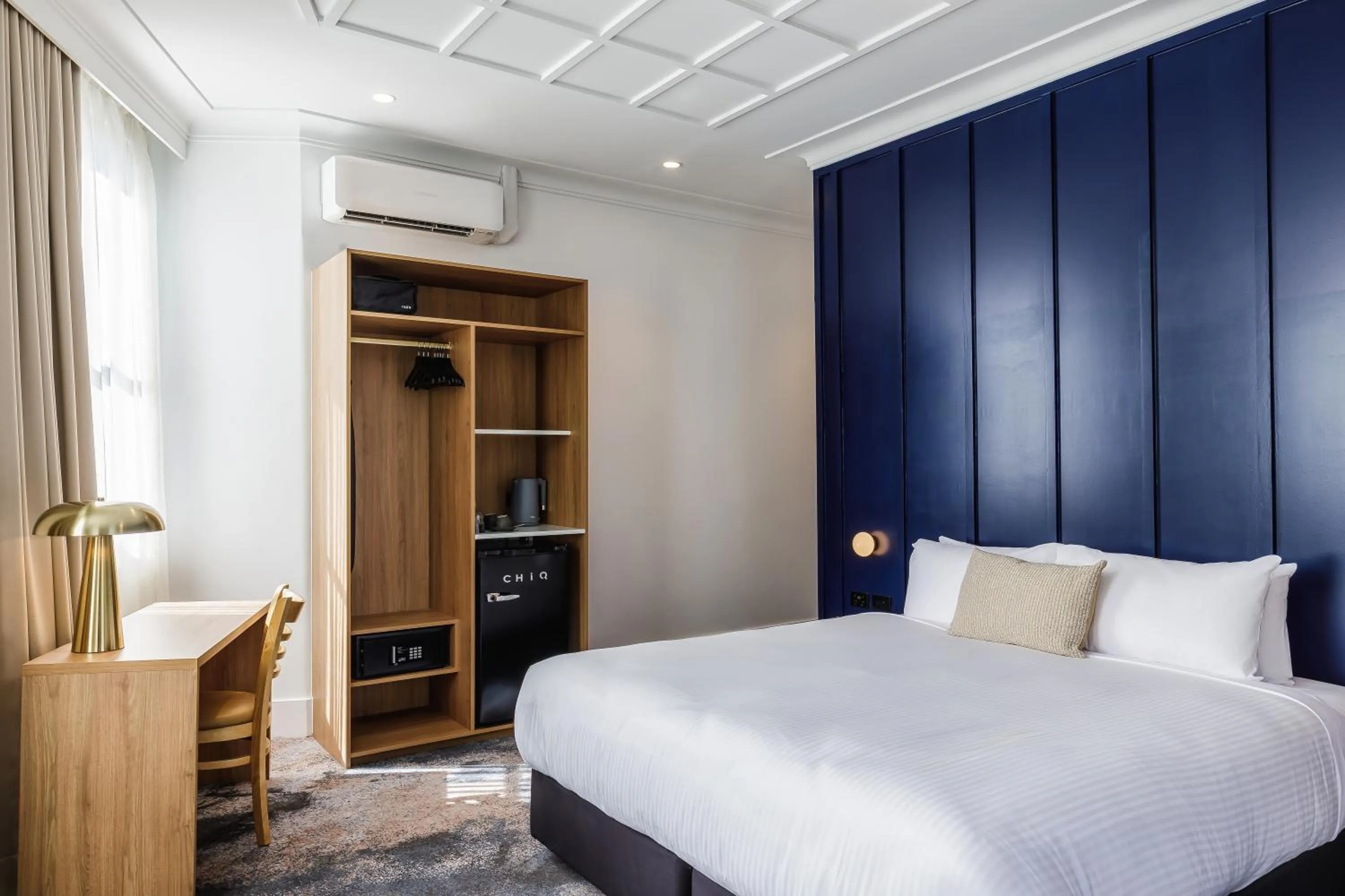 Bed in Royal Exhibition Hotel