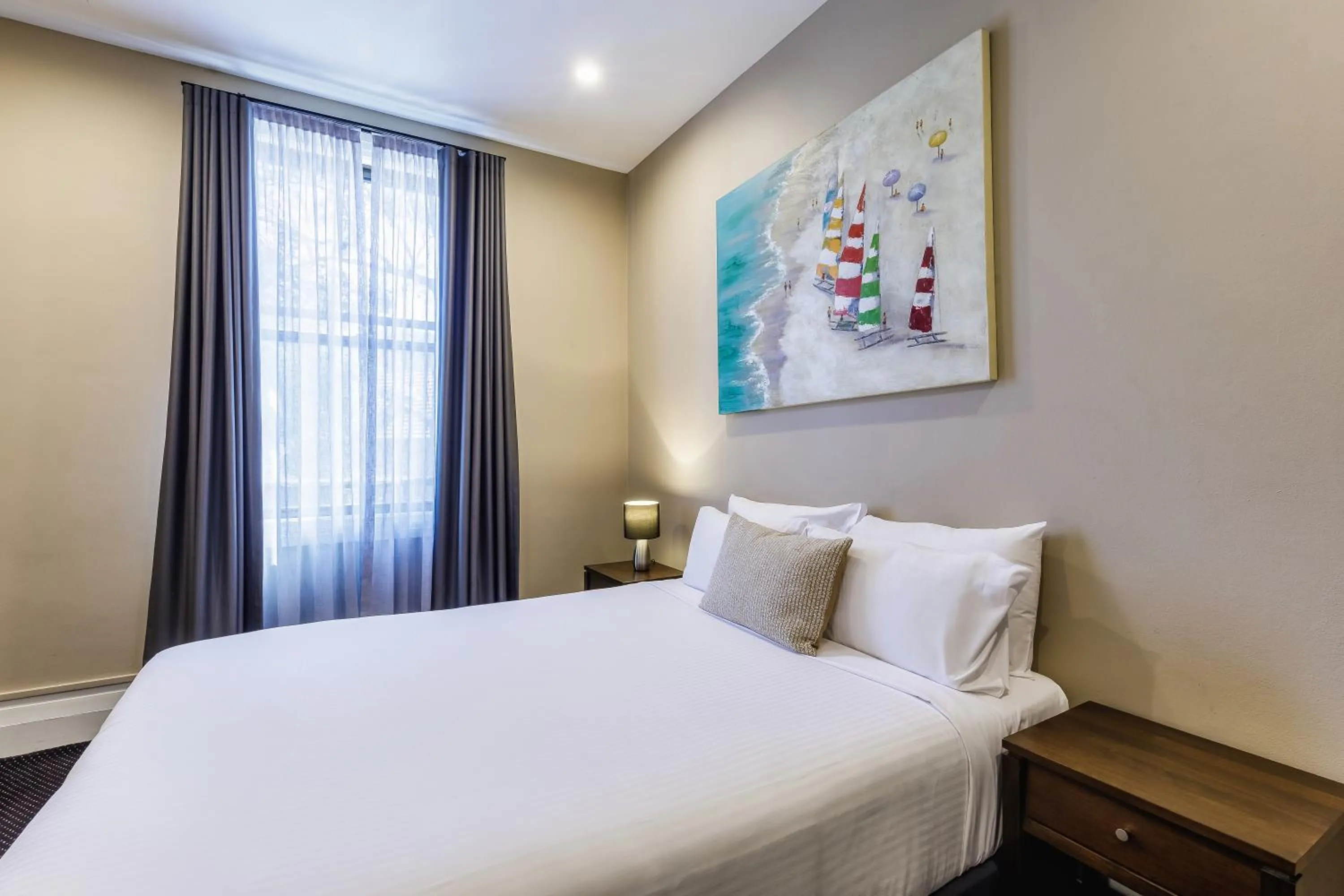 Bed in Royal Exhibition Hotel