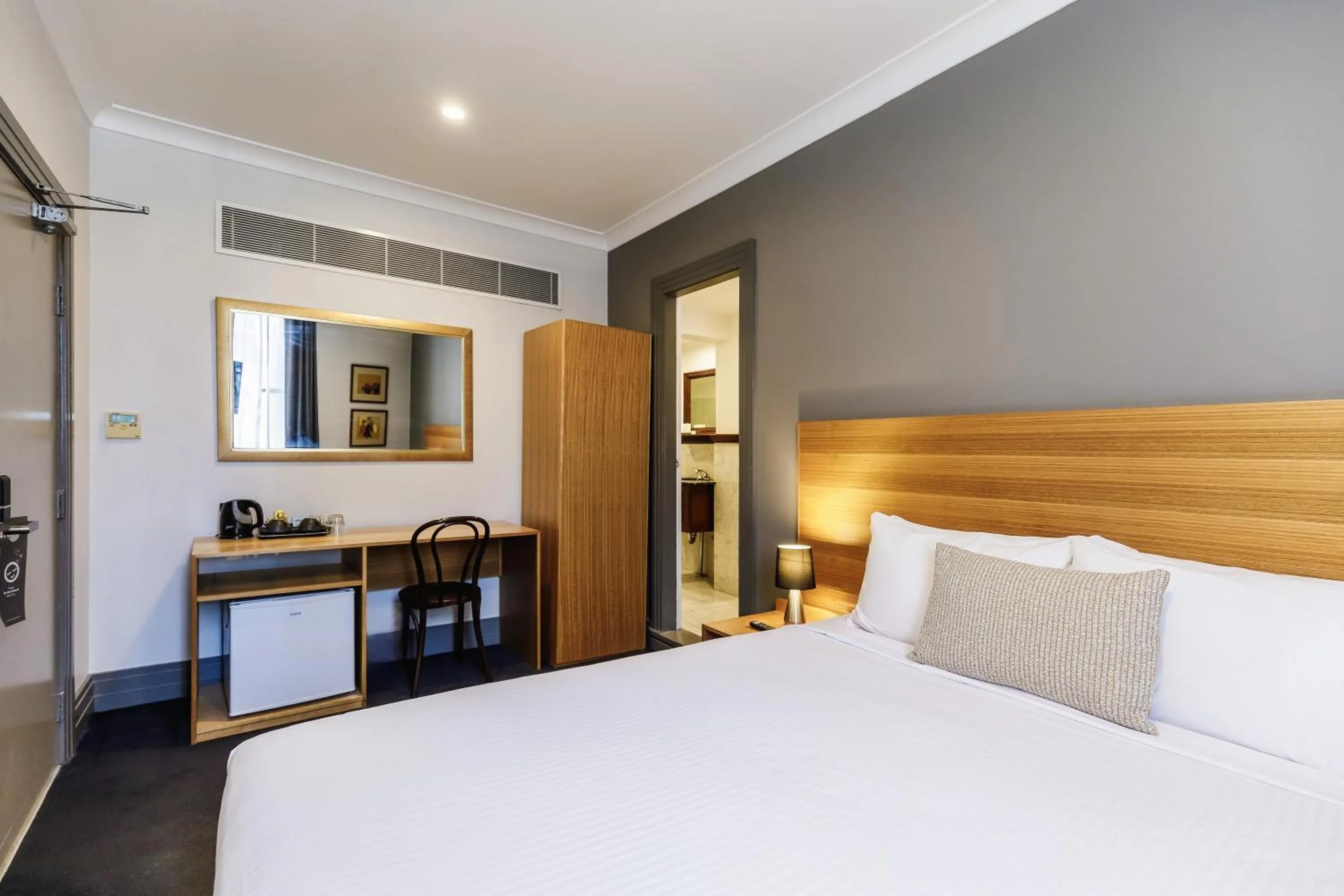 Bed in Royal Exhibition Hotel