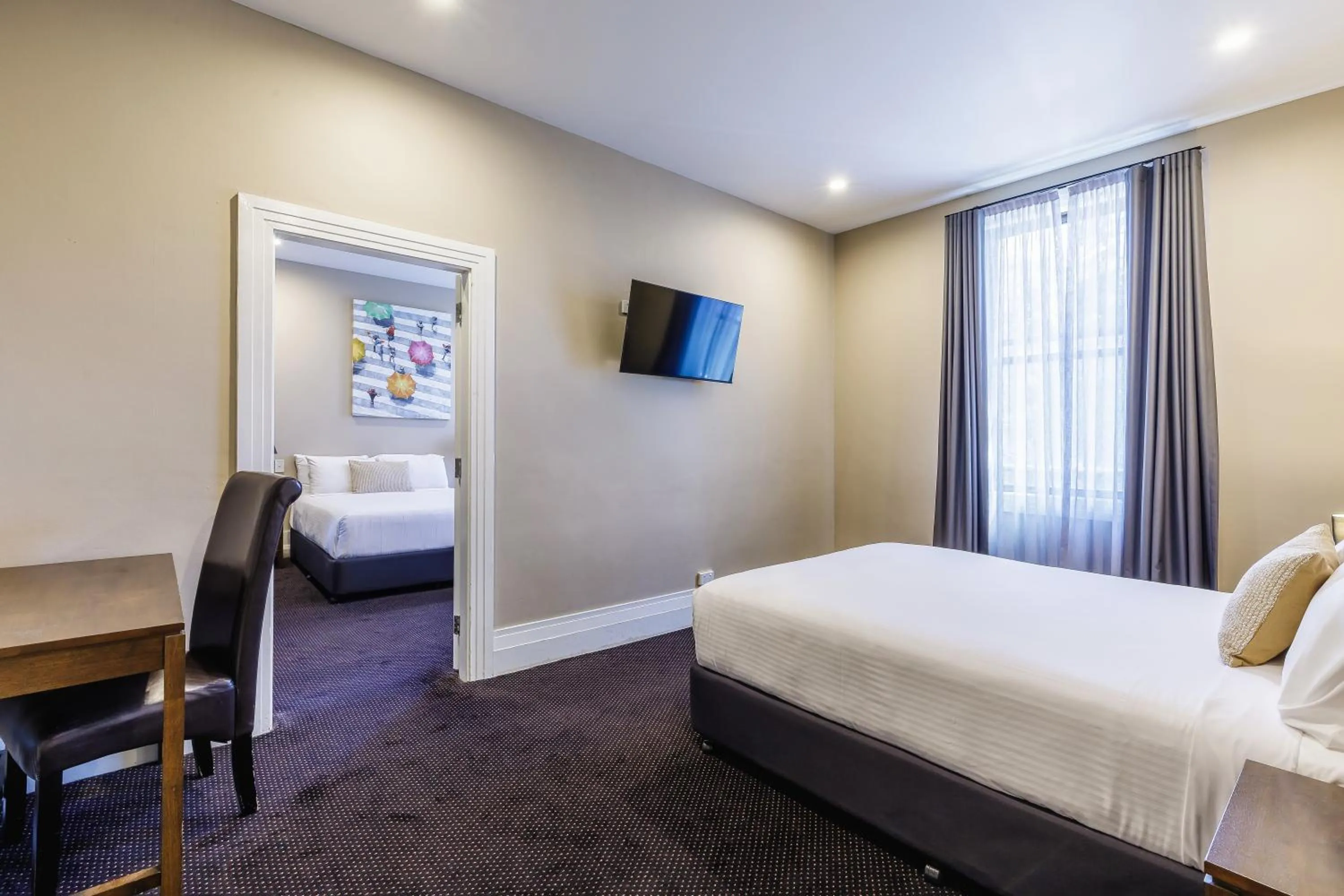 Bed in Royal Exhibition Hotel