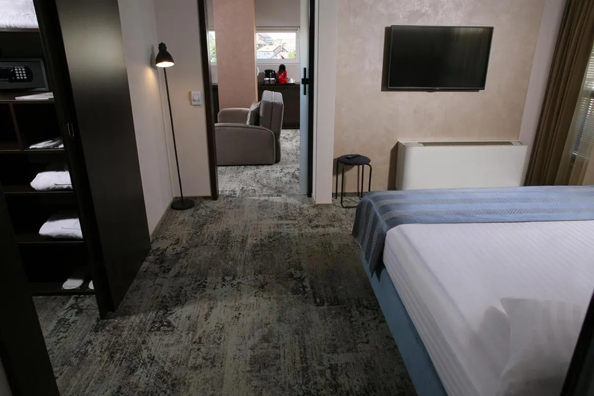 TV and multimedia, Bed in Reghina Blue Hotel