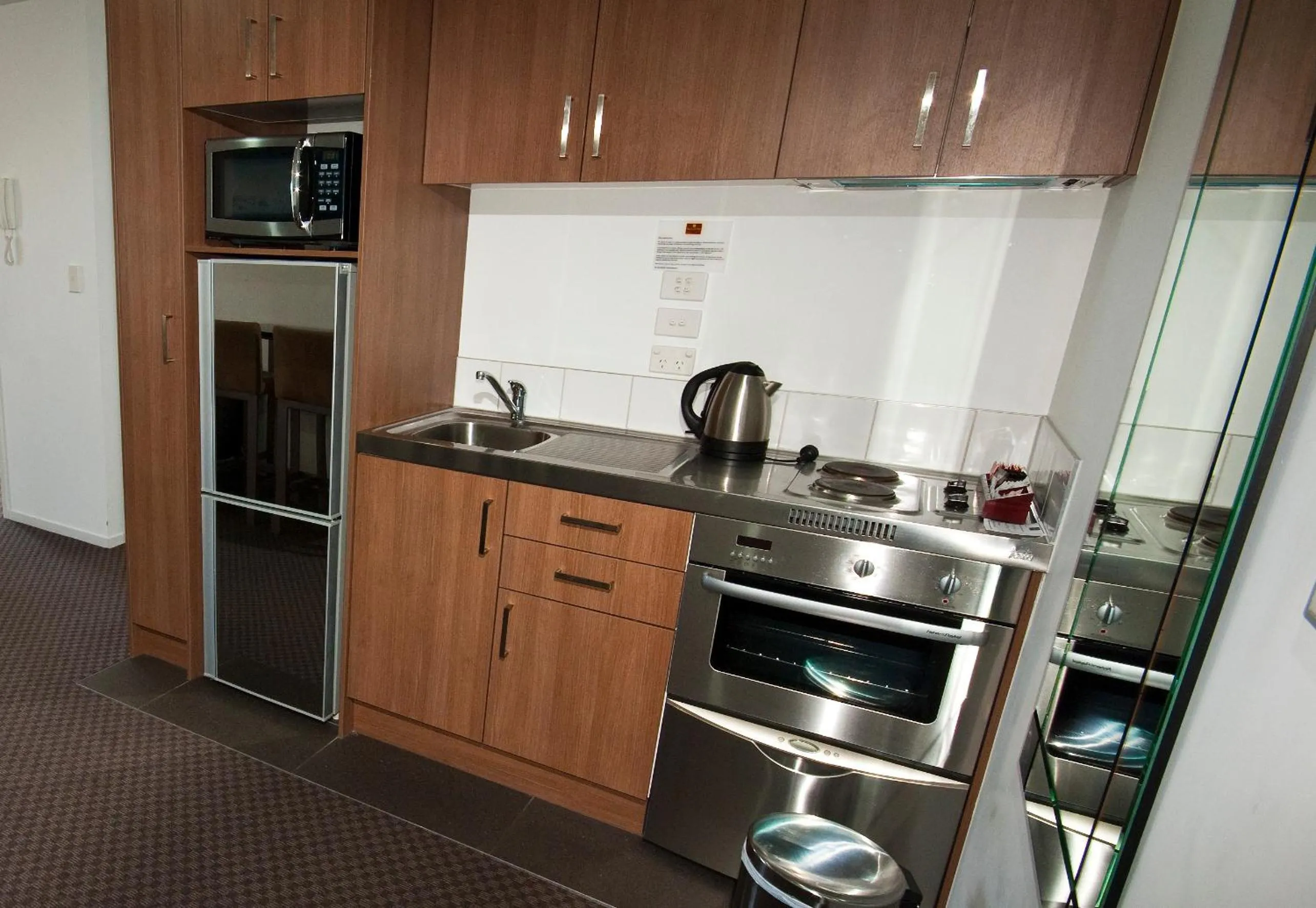 Kitchen or kitchenette in Nesuto St Martins Apartment Hotel