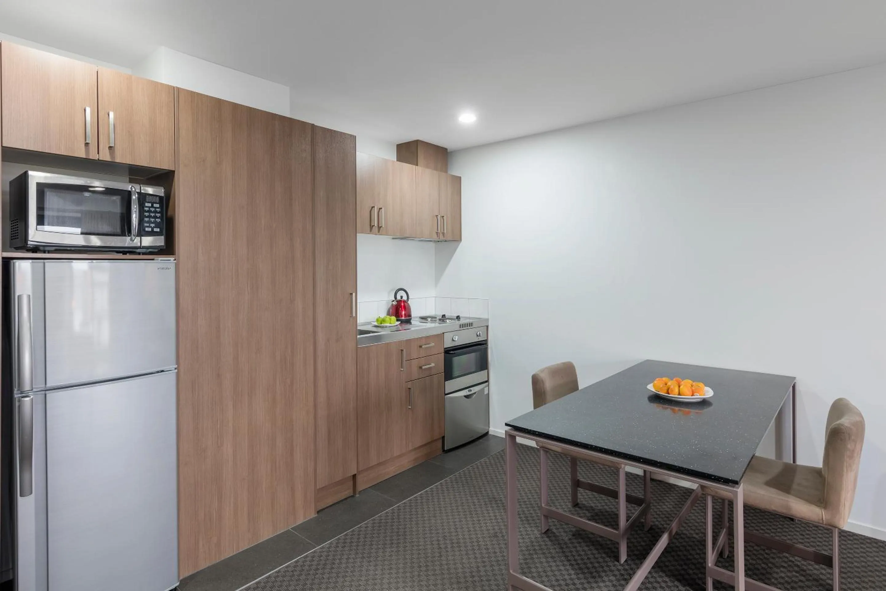 Kitchen or kitchenette in Nesuto St Martins Apartment Hotel