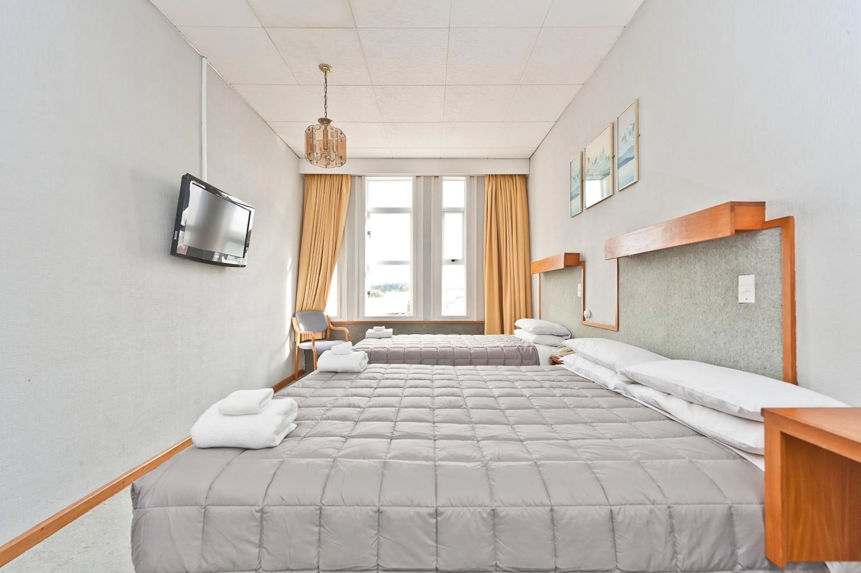 Bed in The Grand Hotel Wanganui