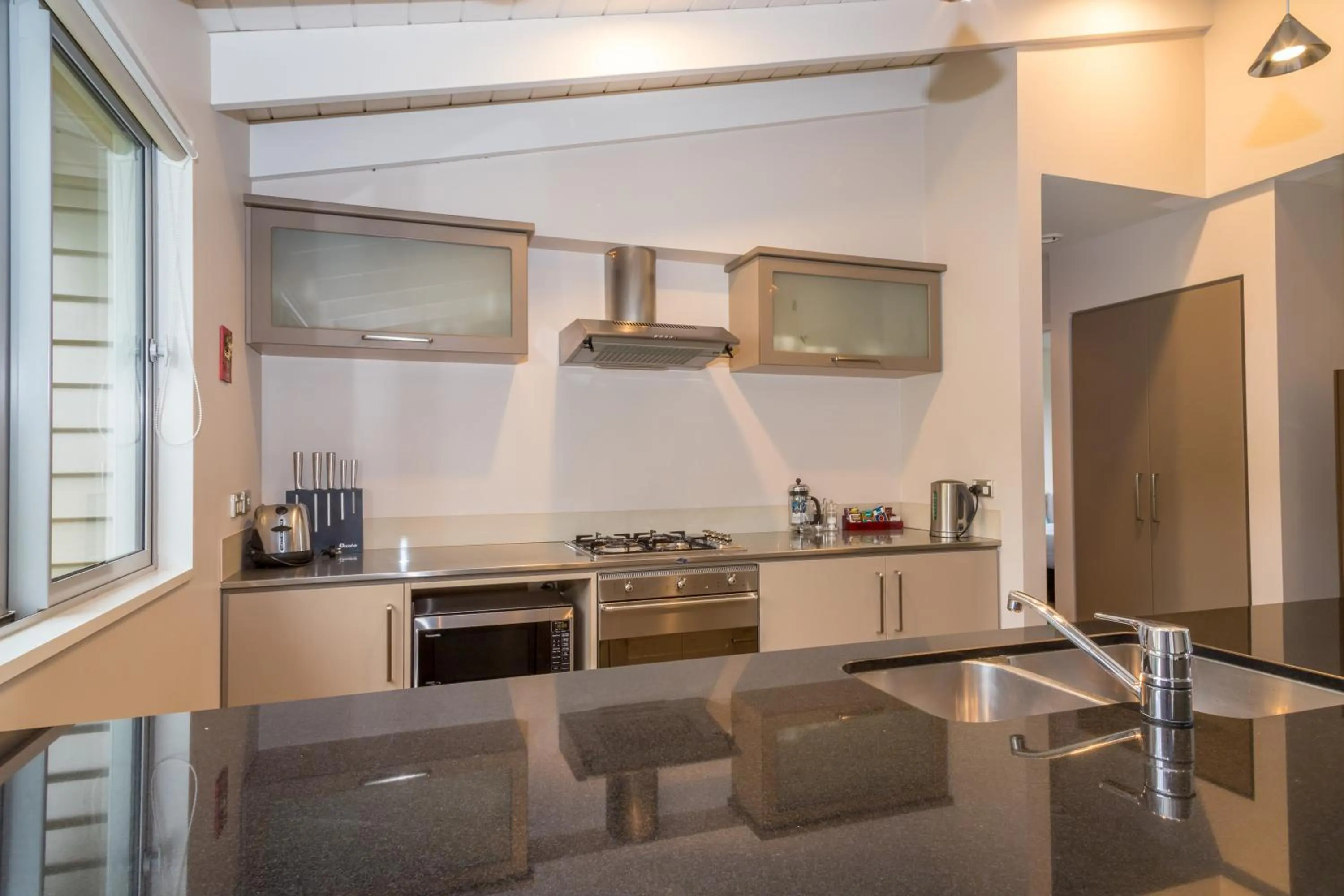 Kitchen or kitchenette in Arrowfield Apartments
