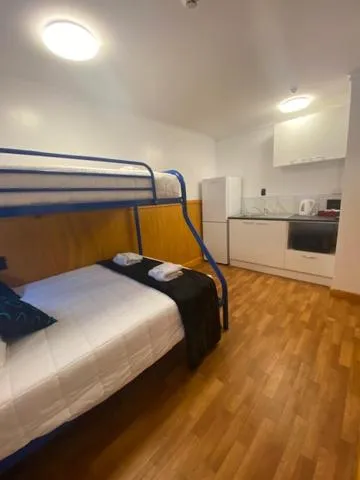 Bed in Lakefront Lodge Taupo