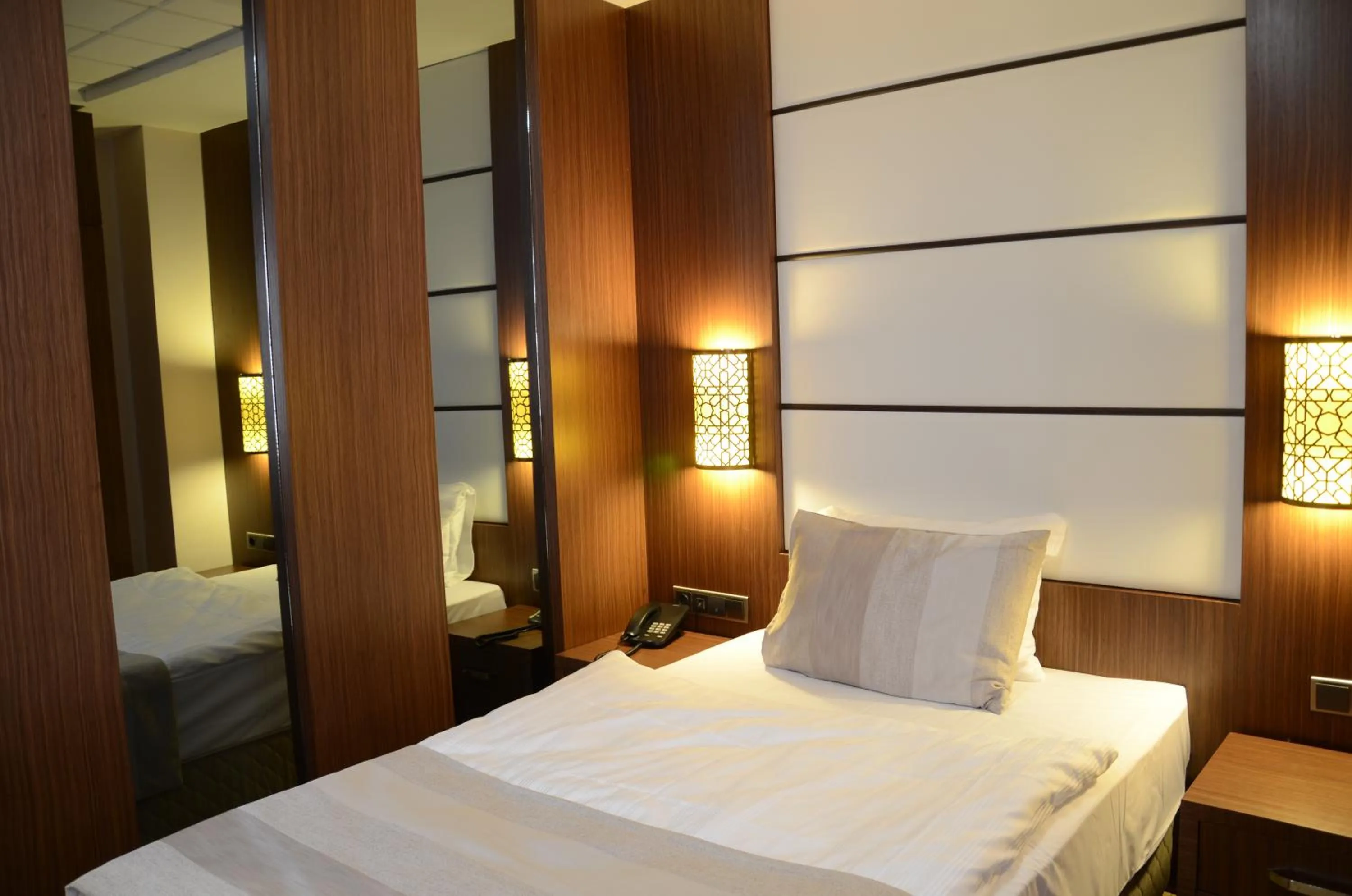 Bed in Safa Royal Museum Hotel