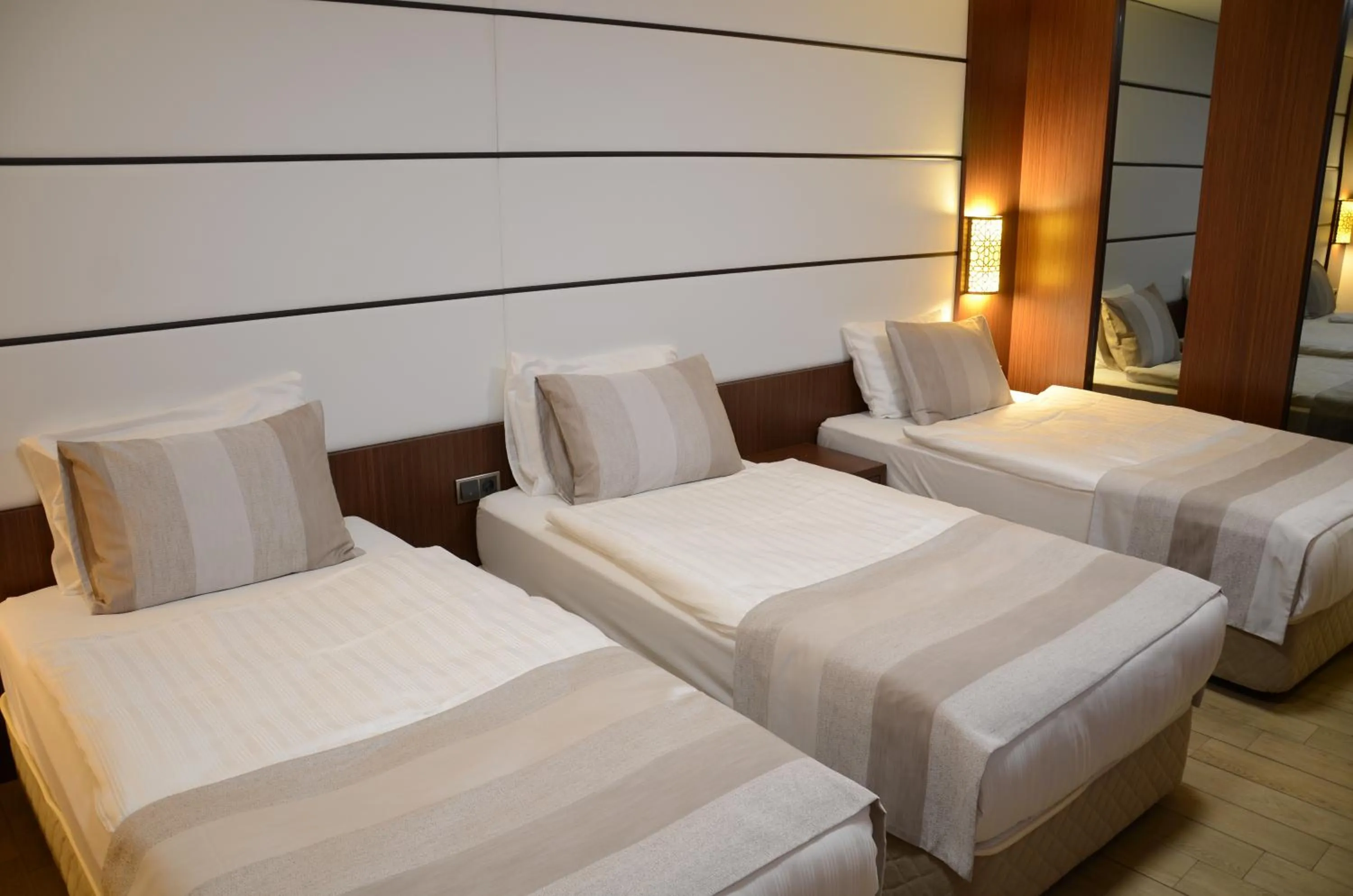 Bed in Safa Royal Museum Hotel