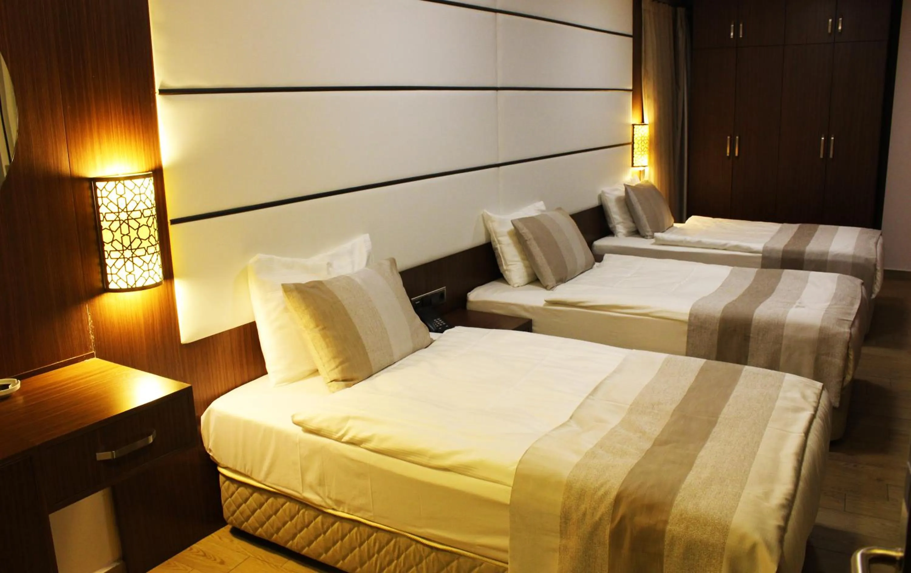 Bed in Safa Royal Museum Hotel