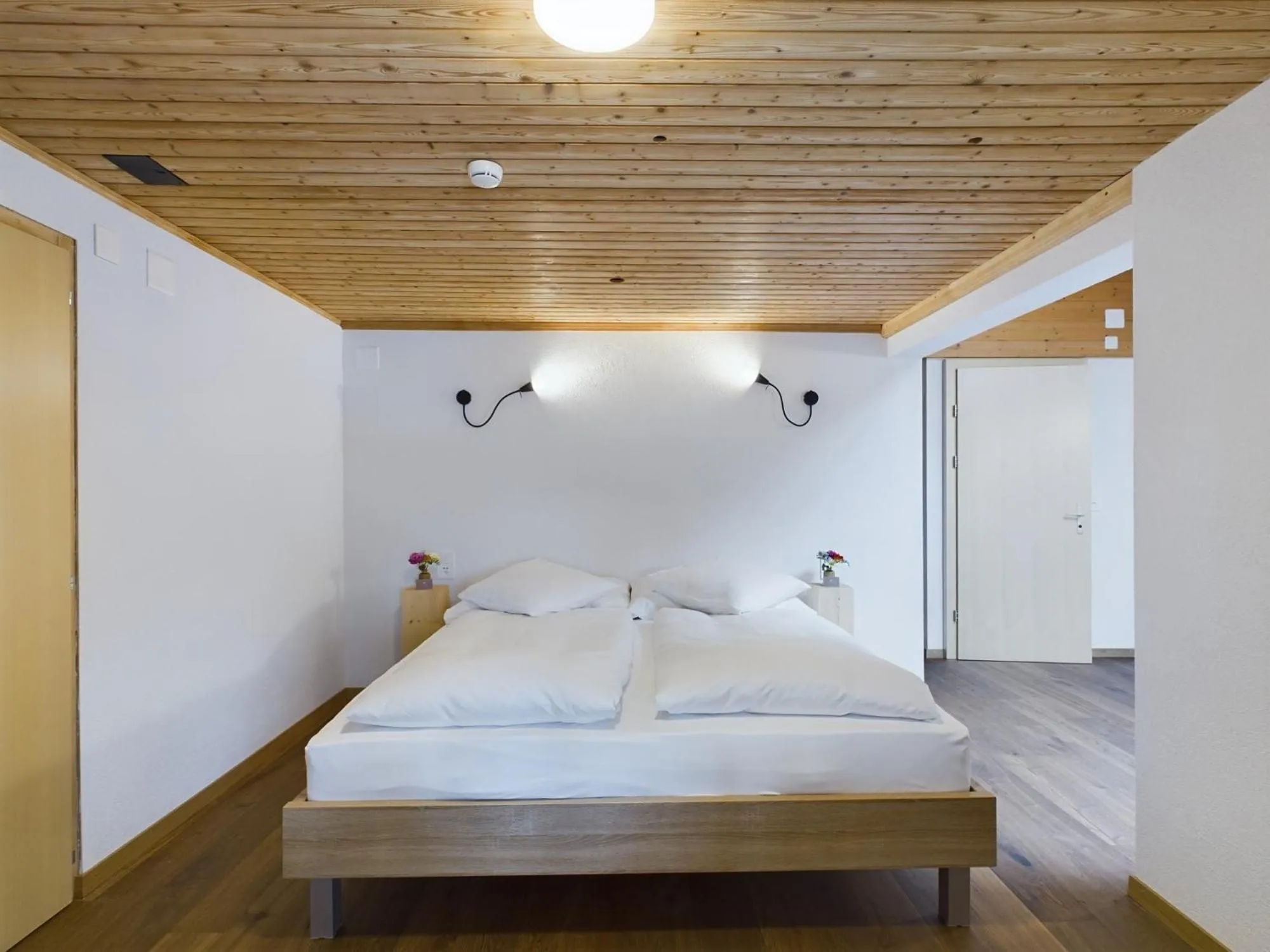 Bed in Bergblick Lodge - 3 Sterne Garni - Neueröffnung