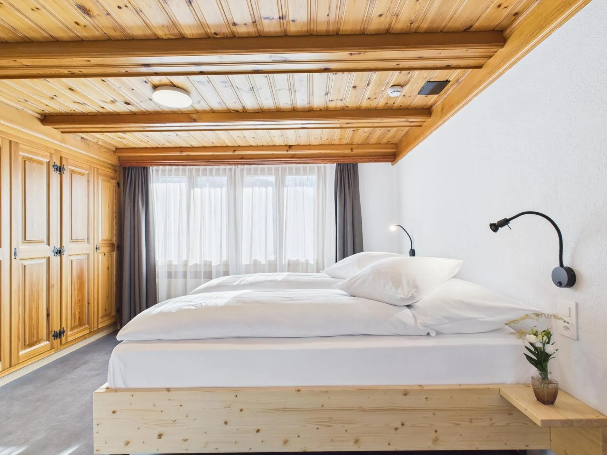 Bed in Bergblick Lodge - 3 Sterne Garni - Neueröffnung