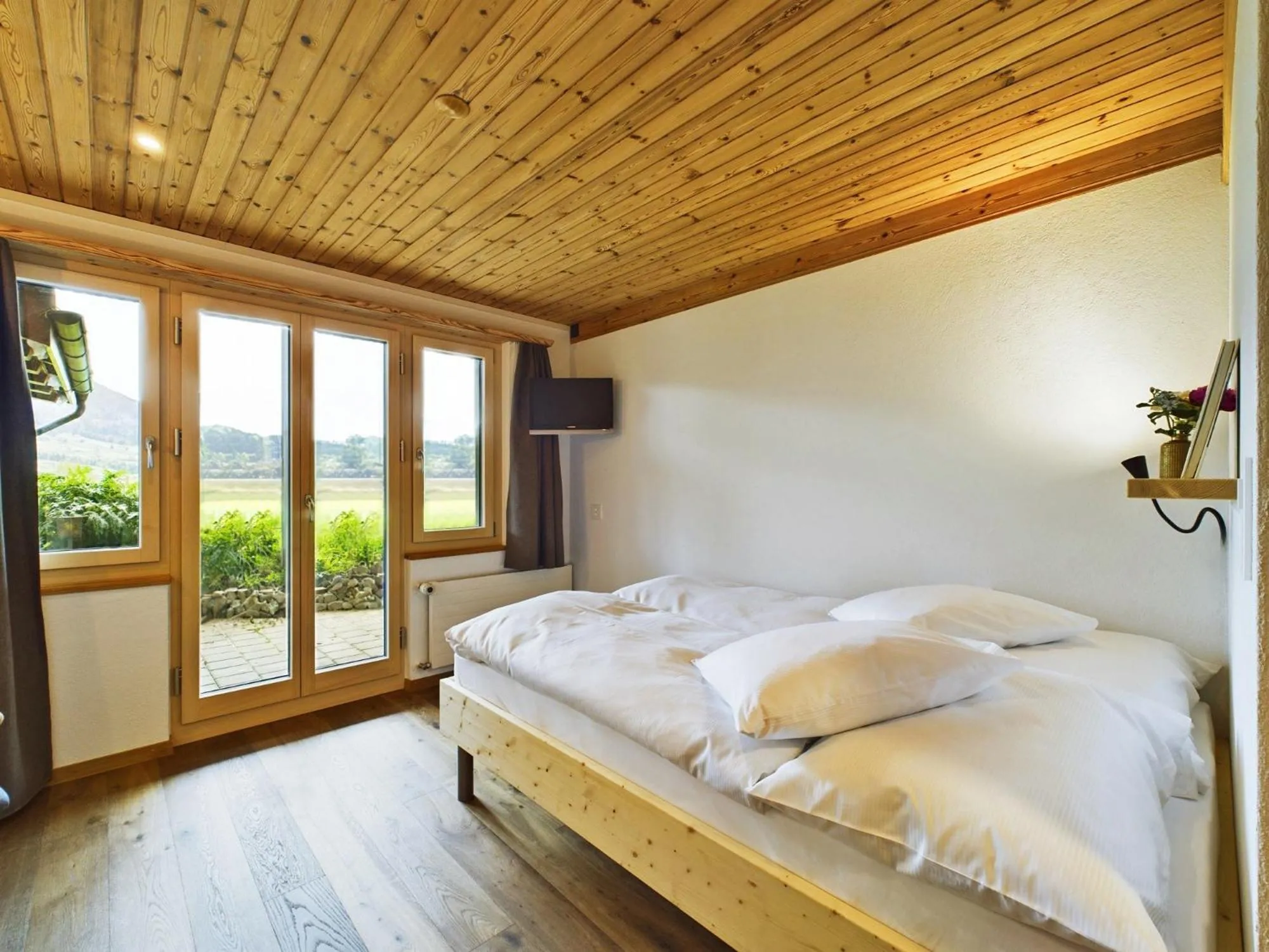 Bed in Bergblick Lodge - 3 Sterne Garni - Neueröffnung