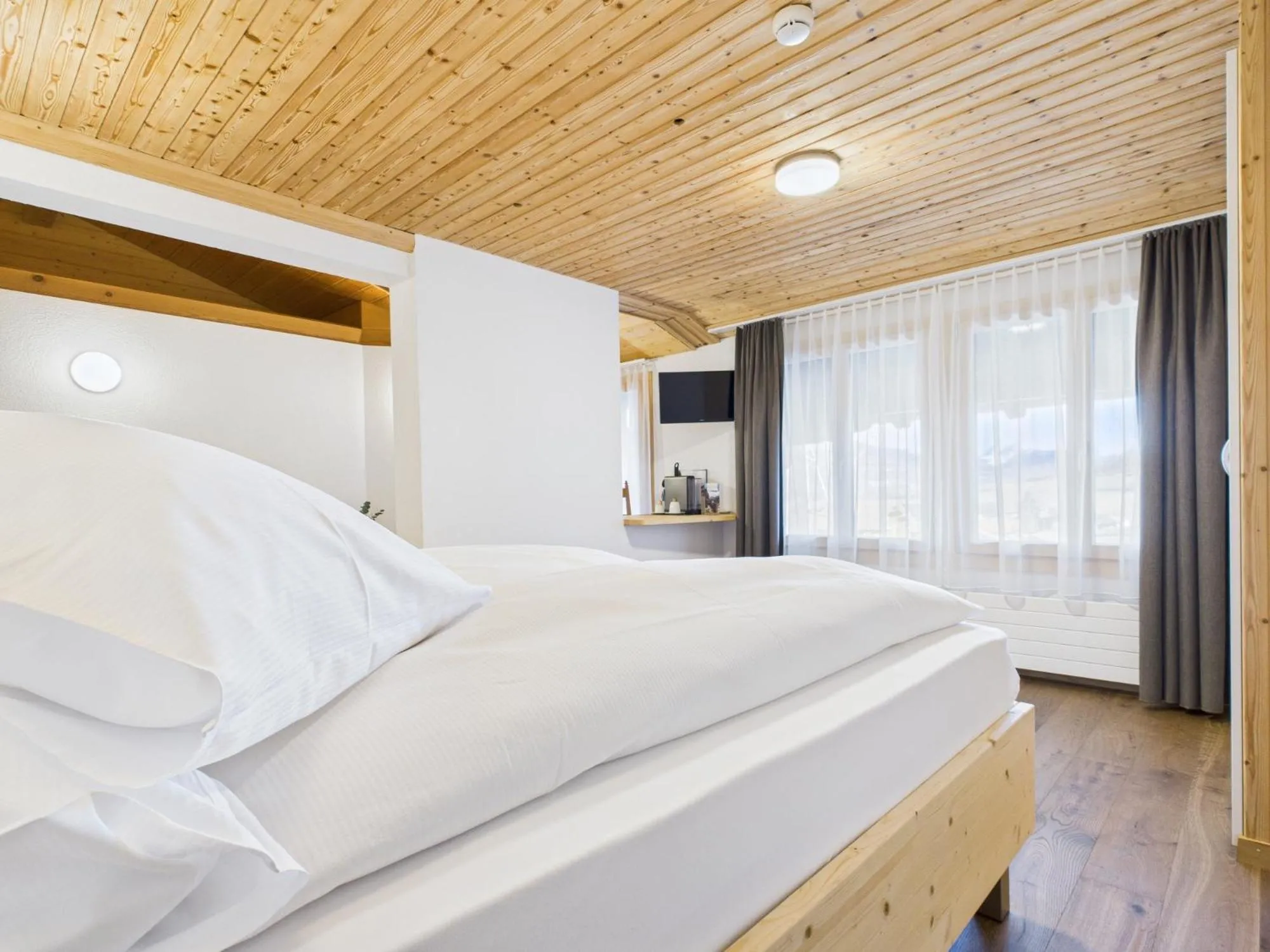 Bed in Bergblick Lodge - 3 Sterne Garni - Neueröffnung