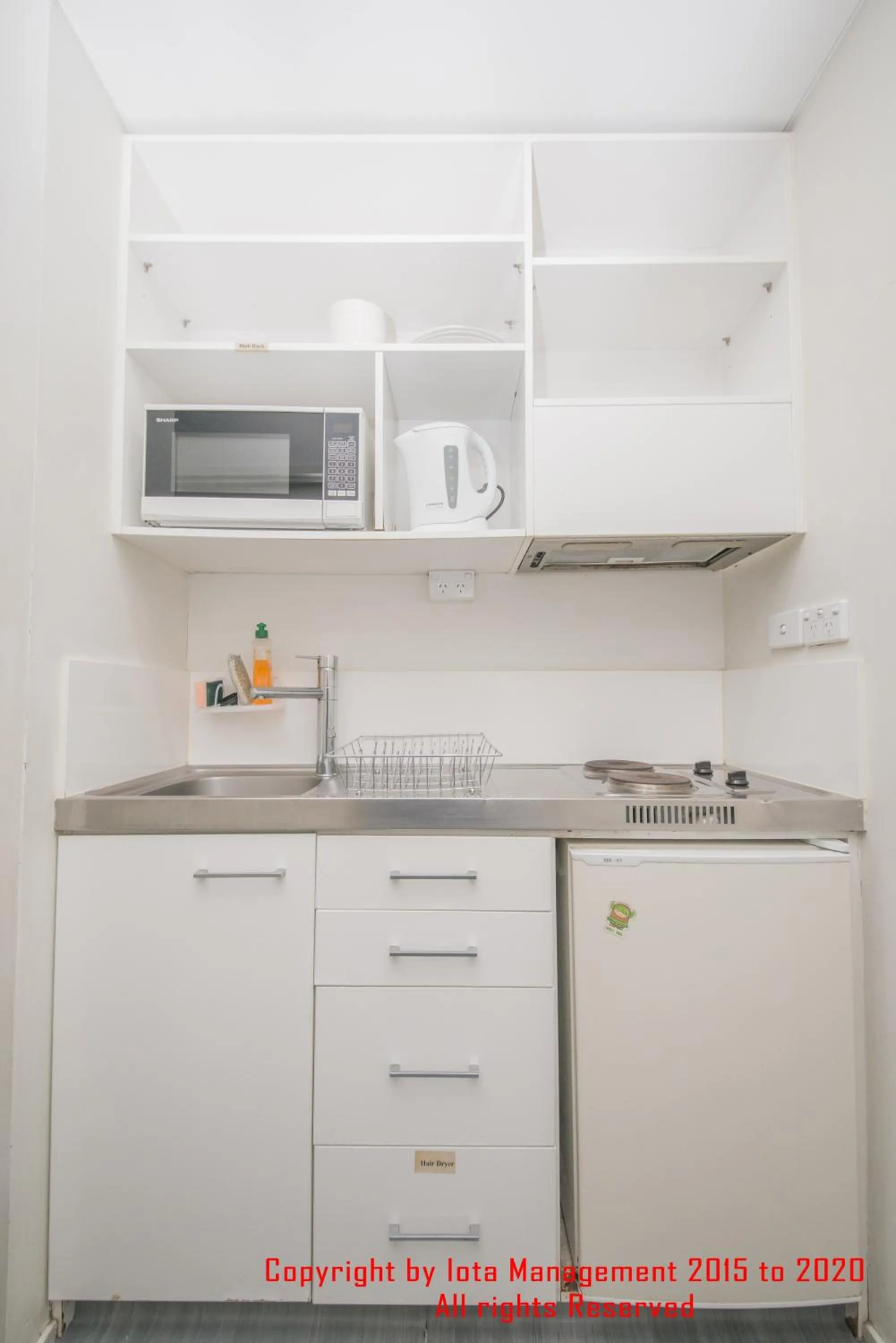 Kitchen or kitchenette in Columbia Apartments