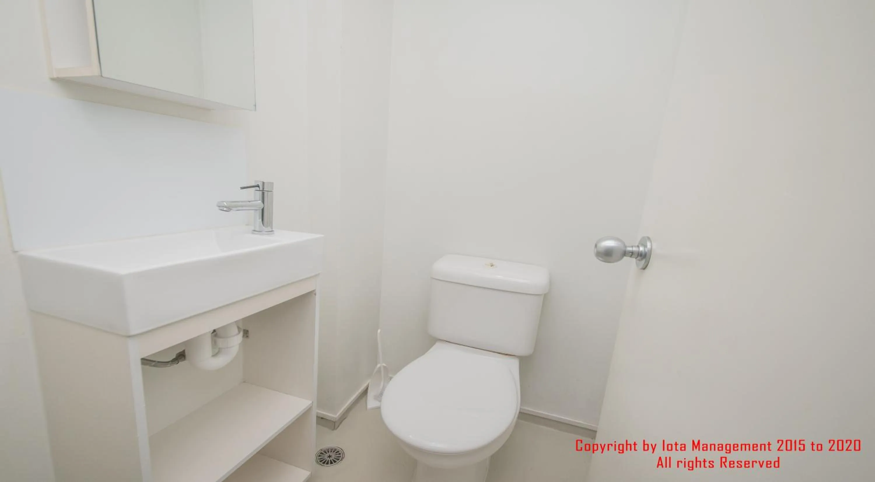 Toilet in Columbia Apartments