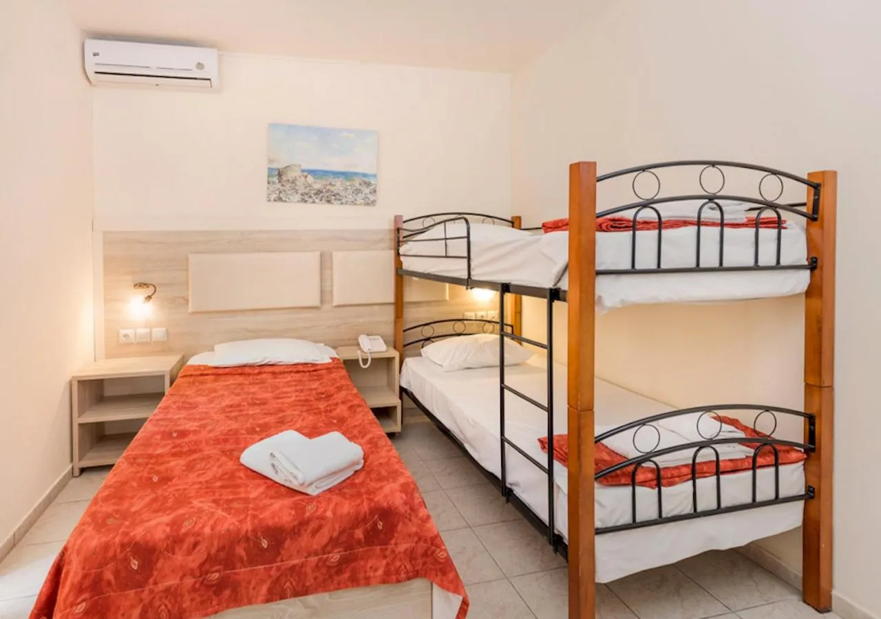 Bed in Eri Beach & Village Hotel