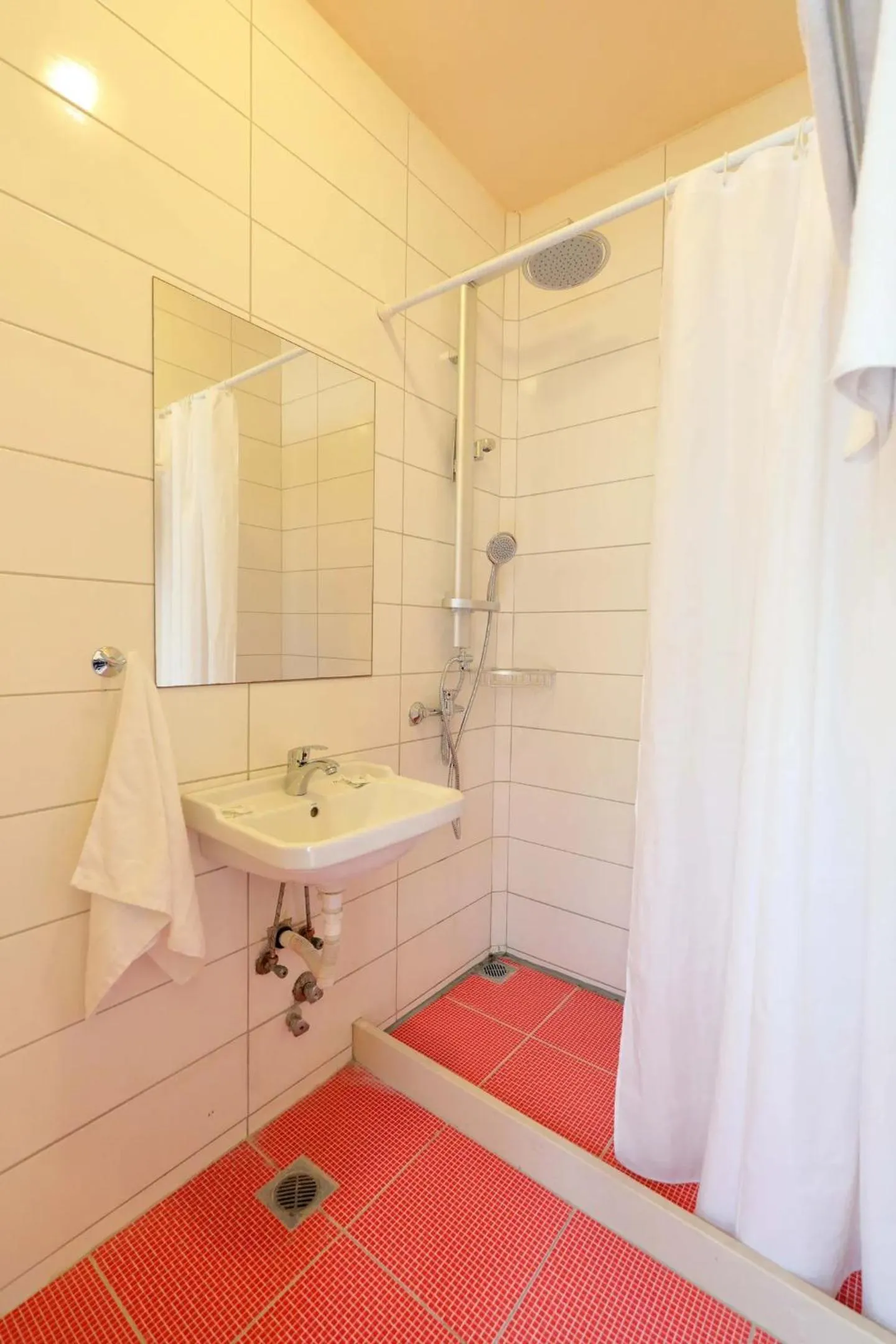 Bathroom in Eri Beach & Village Hotel