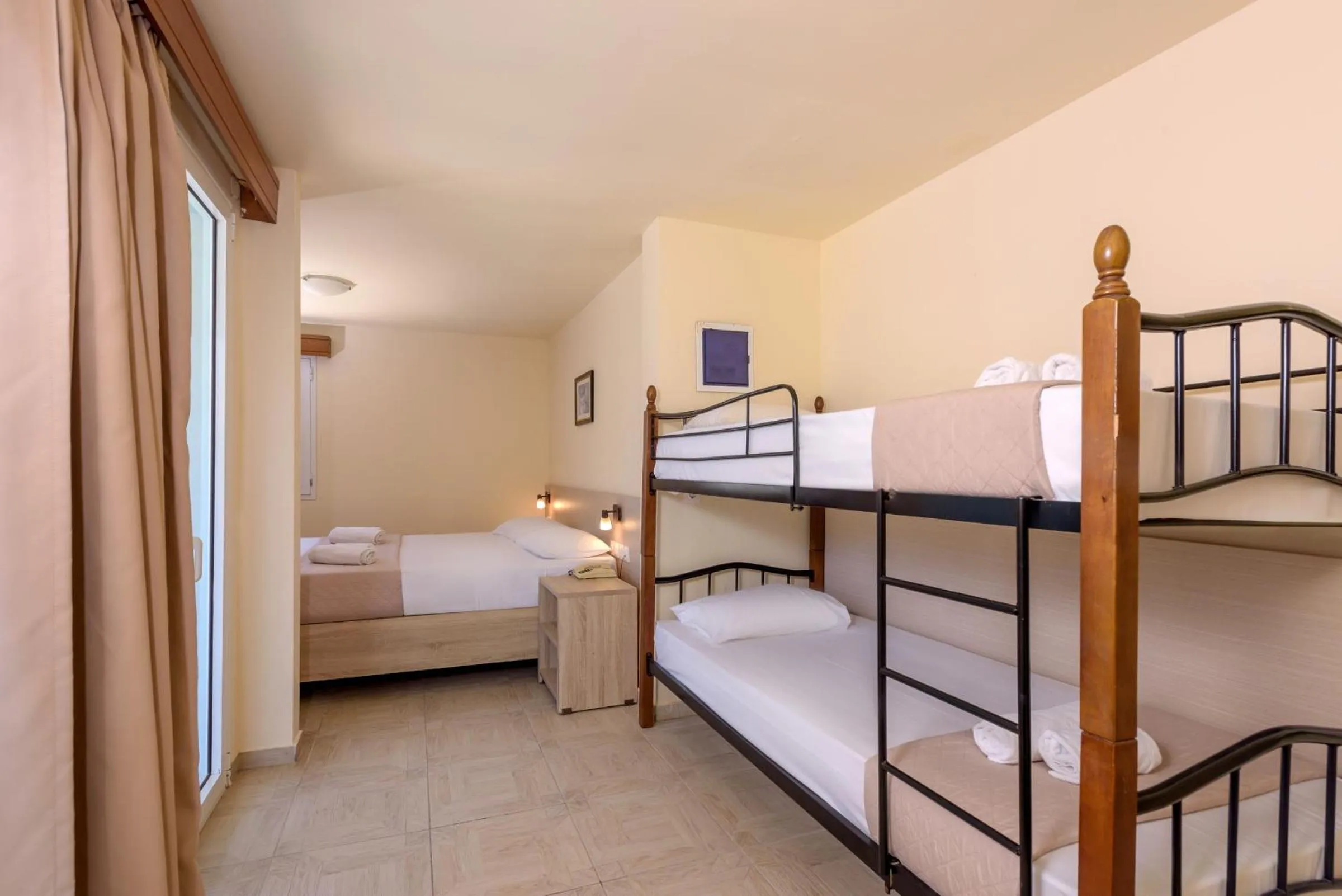 Bedroom in Eri Beach & Village Hotel