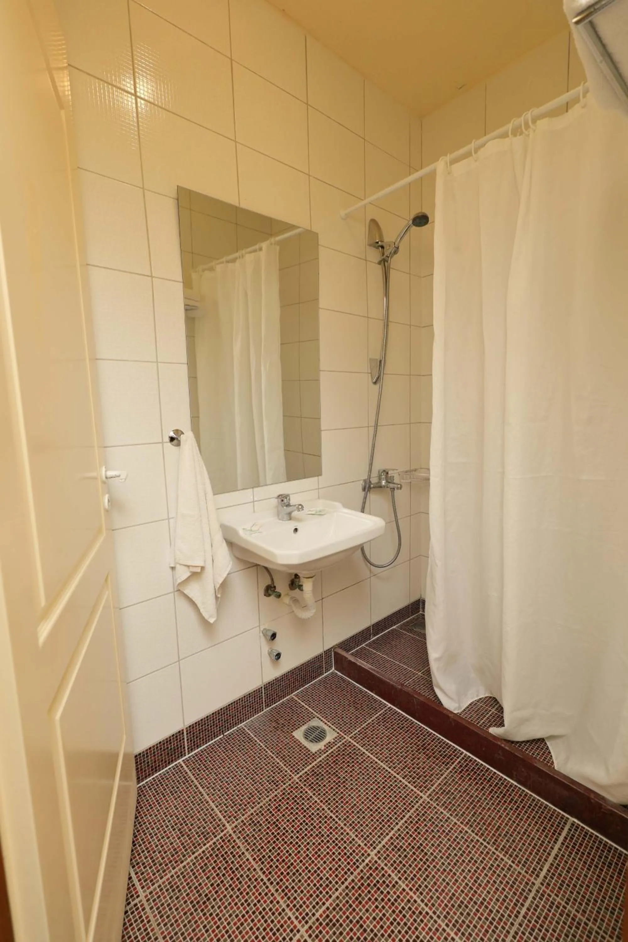 Toilet in Eri Beach & Village Hotel