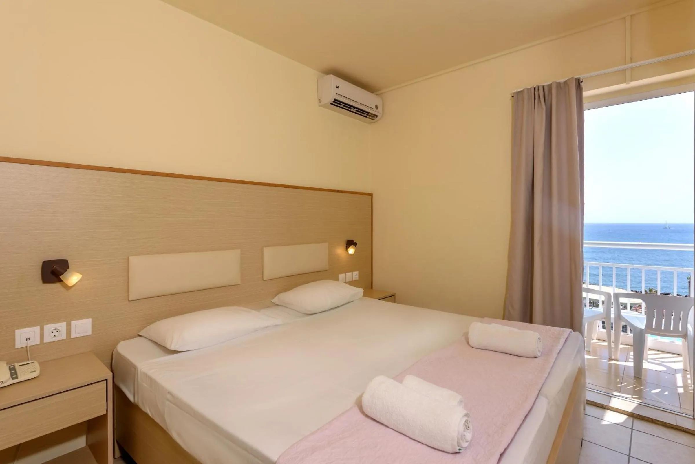 Bedroom in Eri Beach & Village Hotel