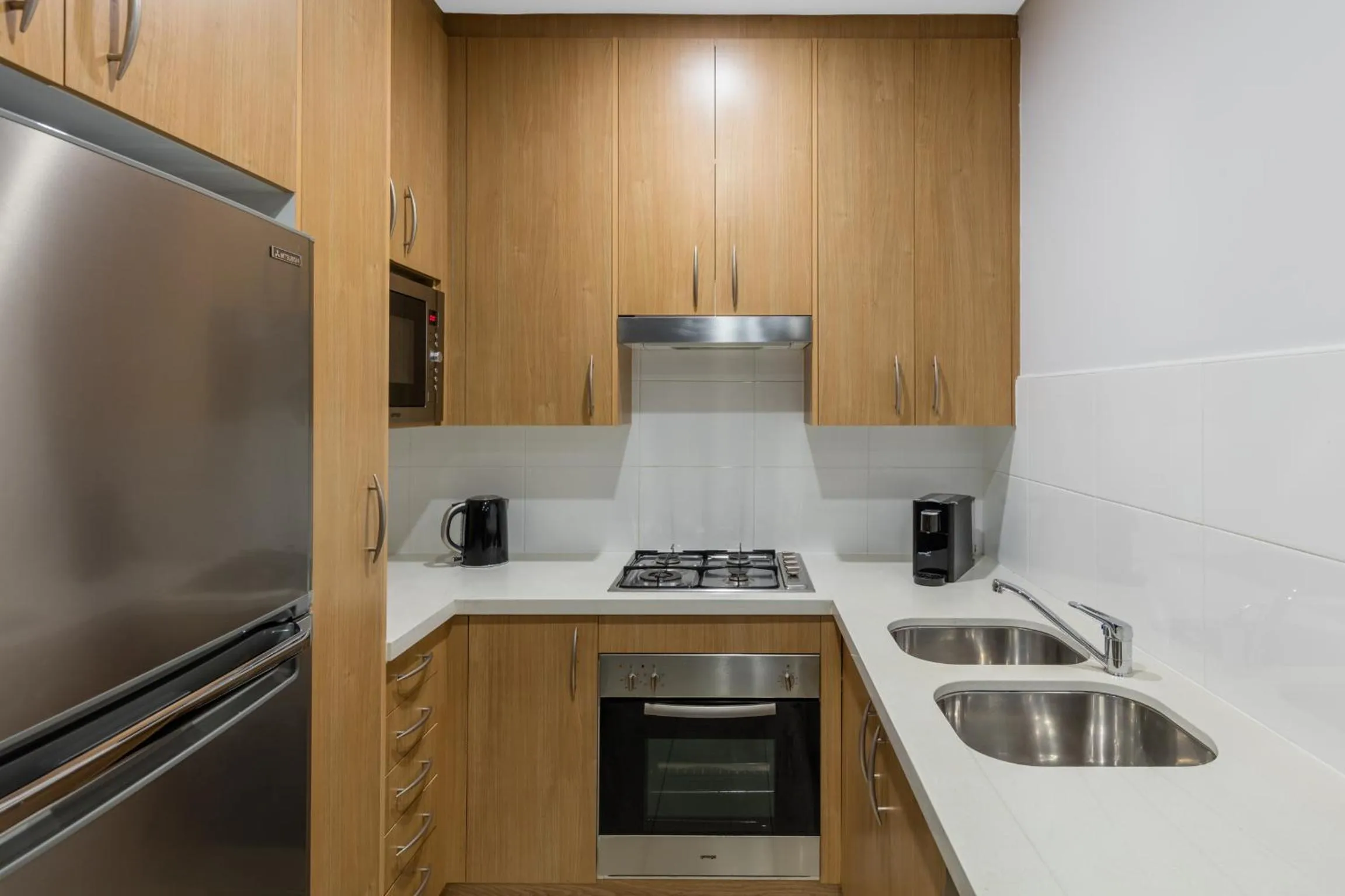Kitchen or kitchenette in Meriton Suites Waterloo