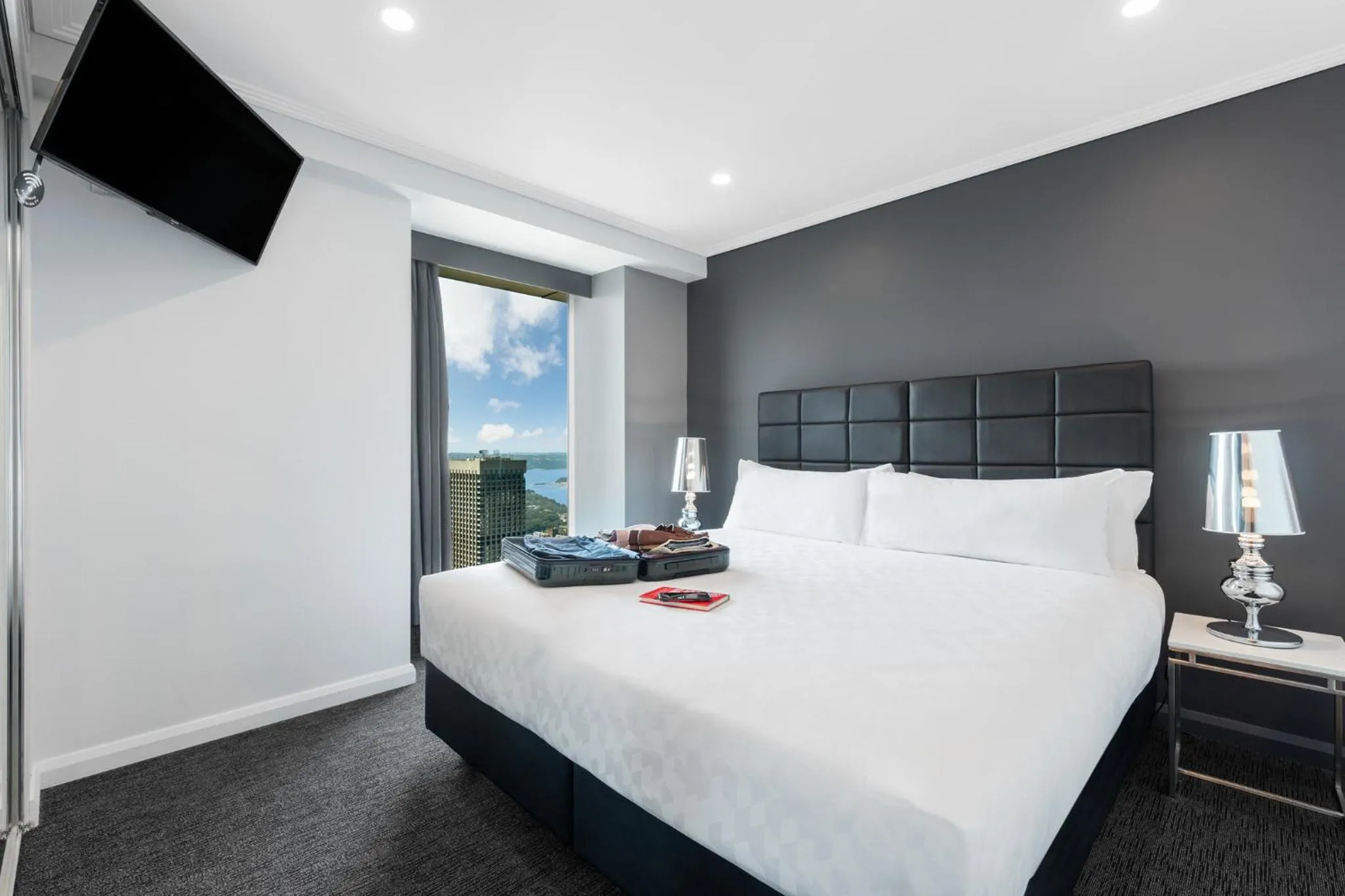 Bed in Meriton Suites World Tower, Sydney