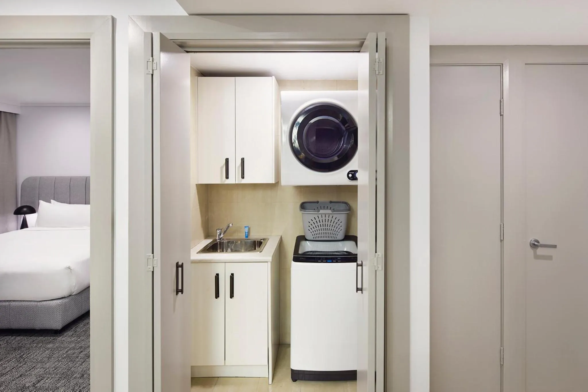 Bed in Meriton Suites Pitt Street, Sydney