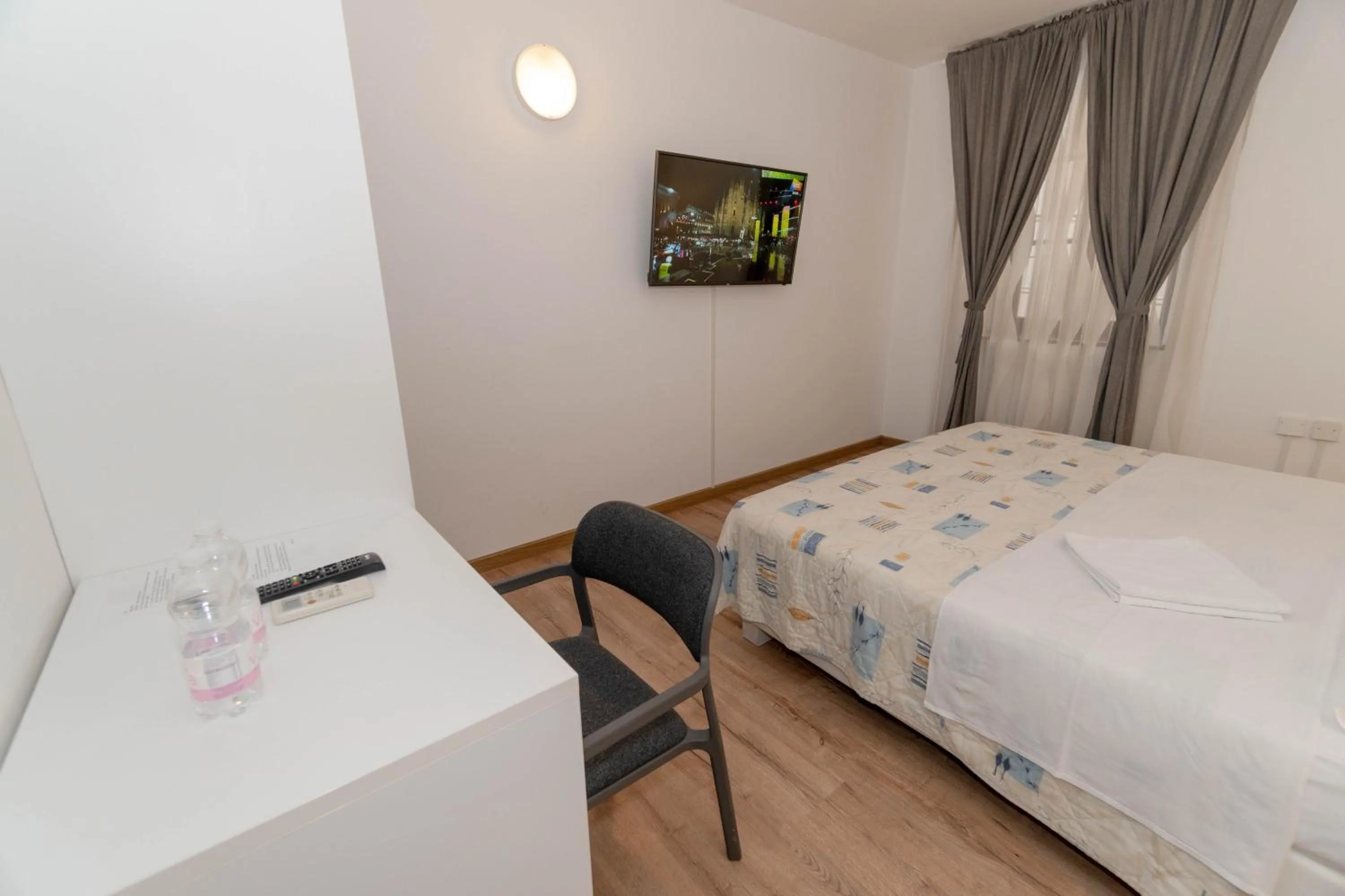 TV and multimedia, Bed in Hotel Paquito