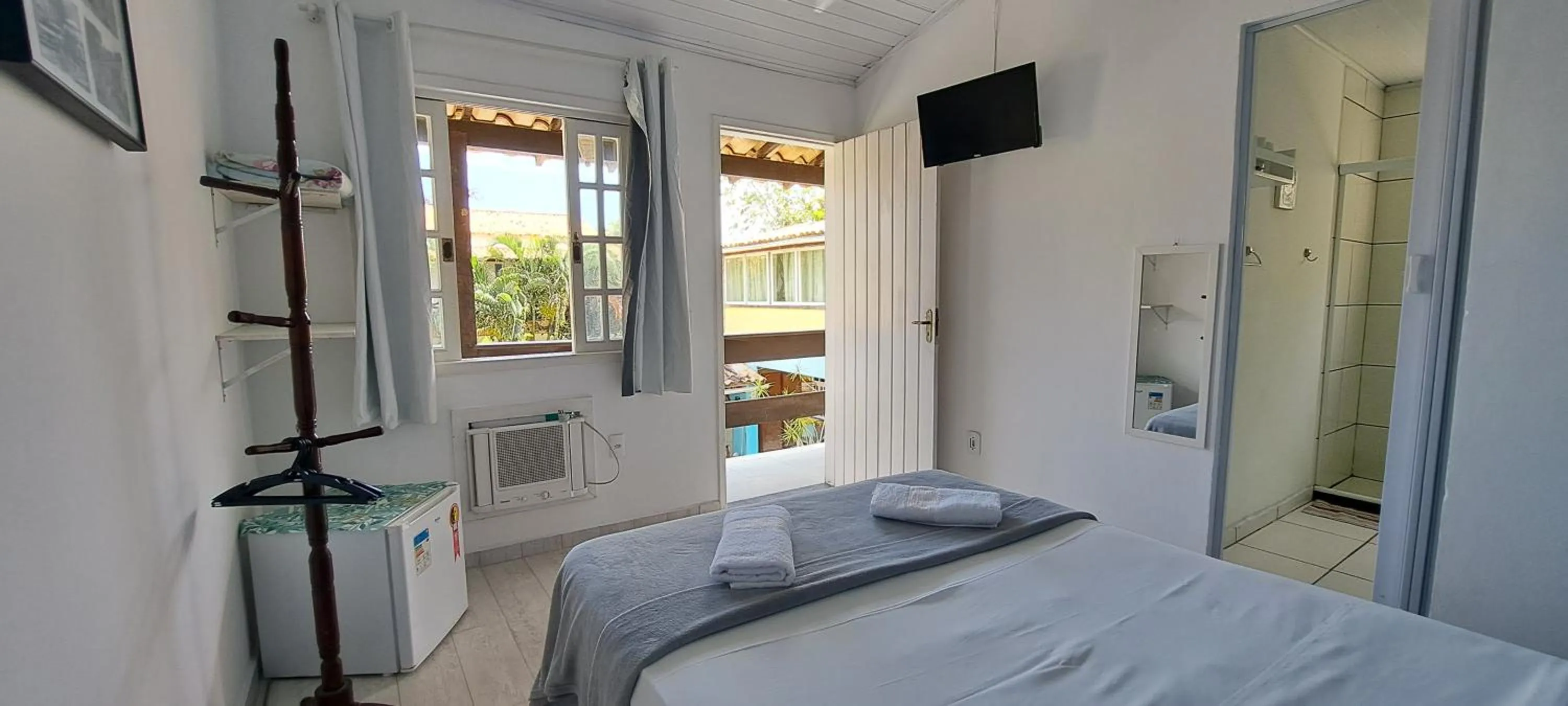 Photo of the whole room in As Palmeiras Pousada